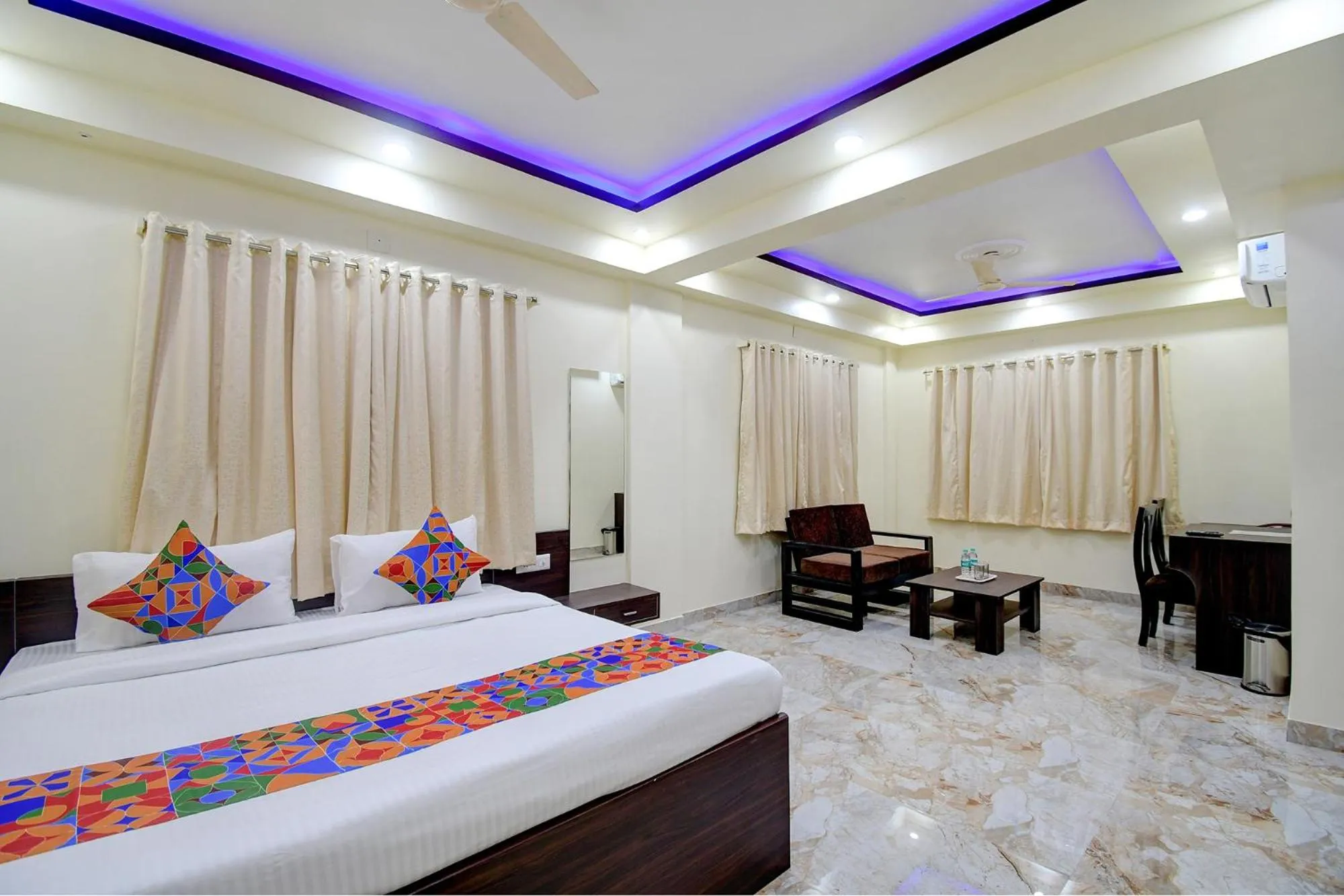 Bed in FabHotel Anchorage Inn - Nr Axis Mall