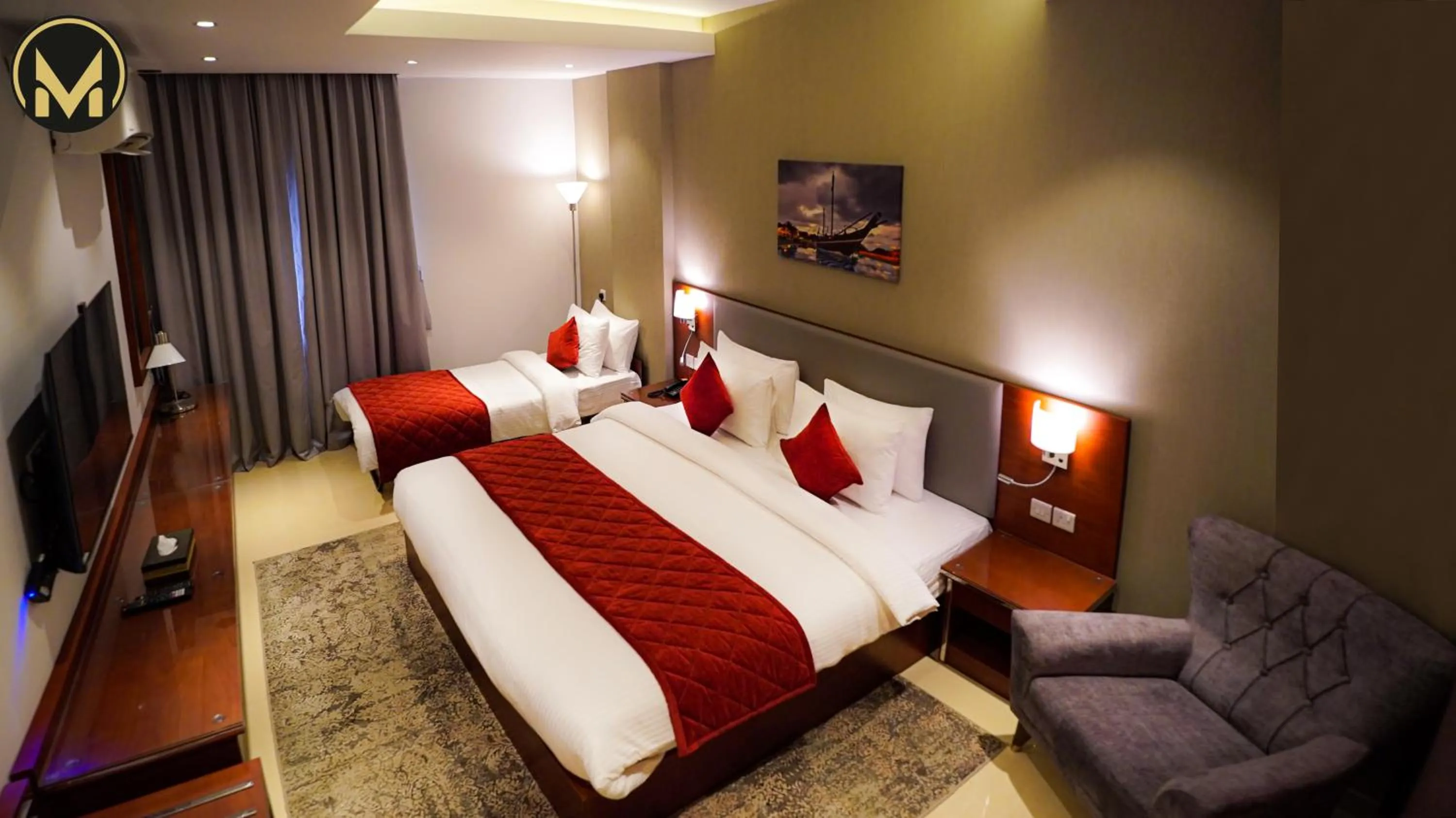 Bed in Muscat Express Hotel