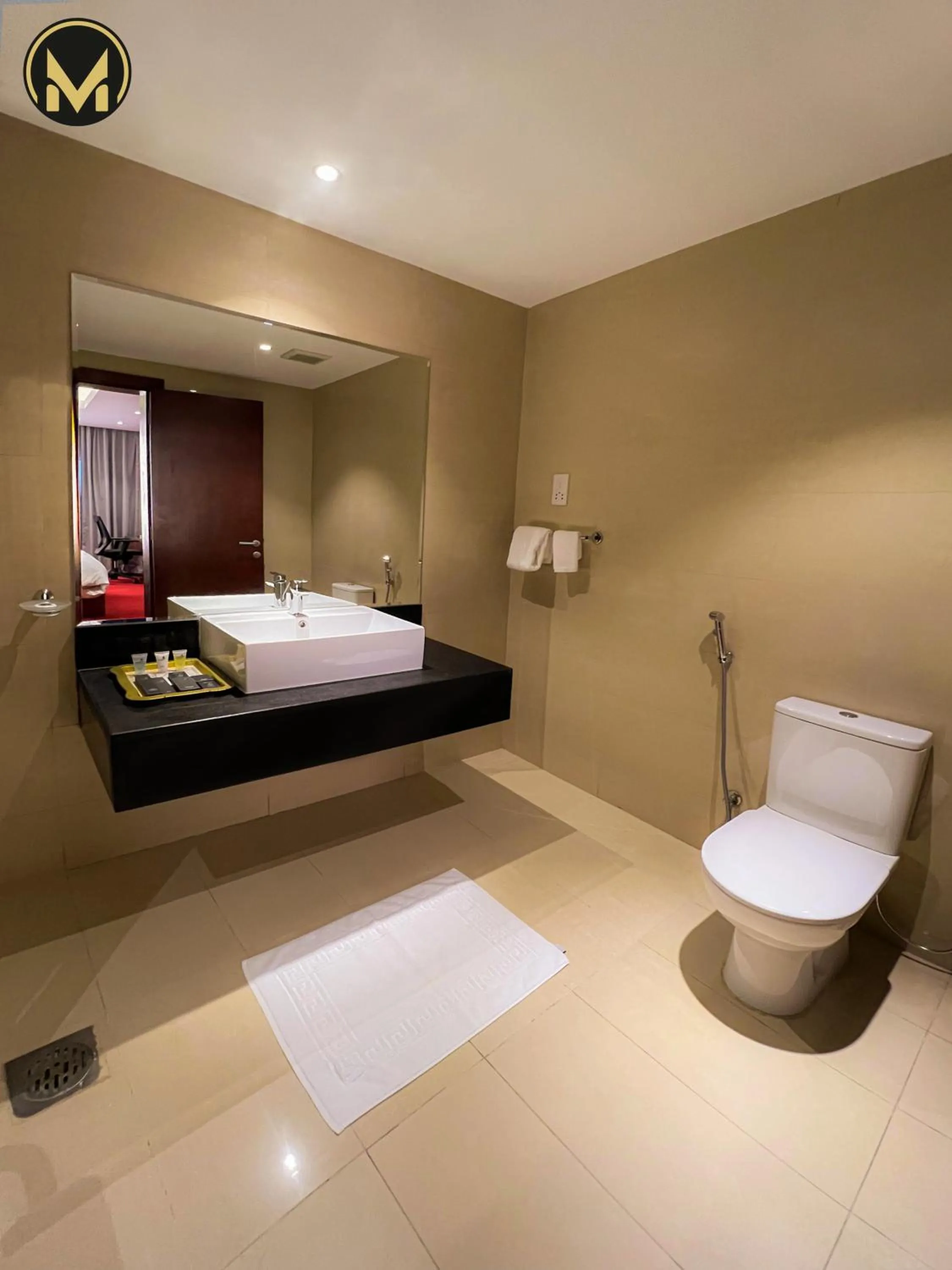 Bathroom, Bed in Muscat Express Hotel