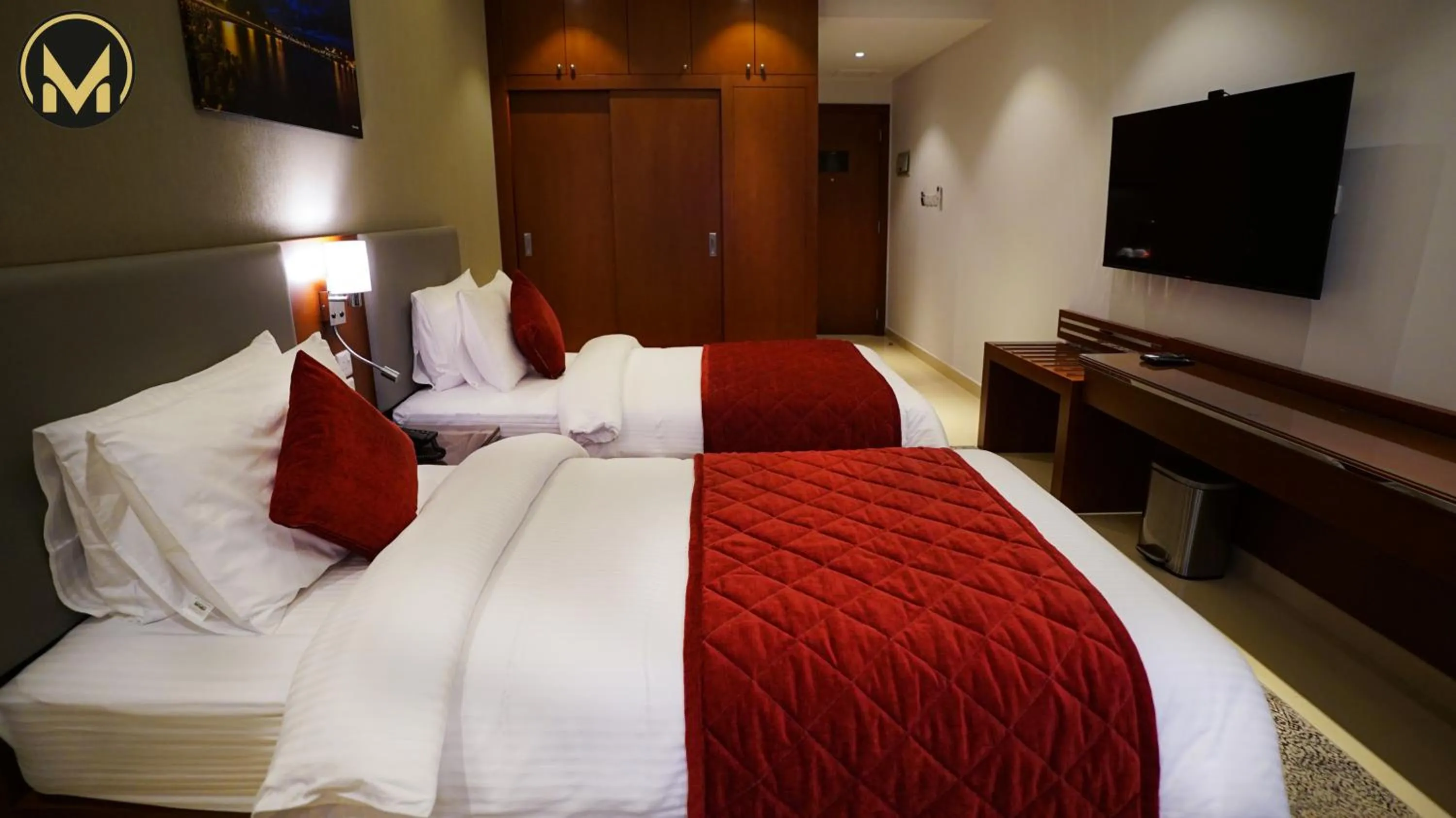 Bed in Muscat Express Hotel