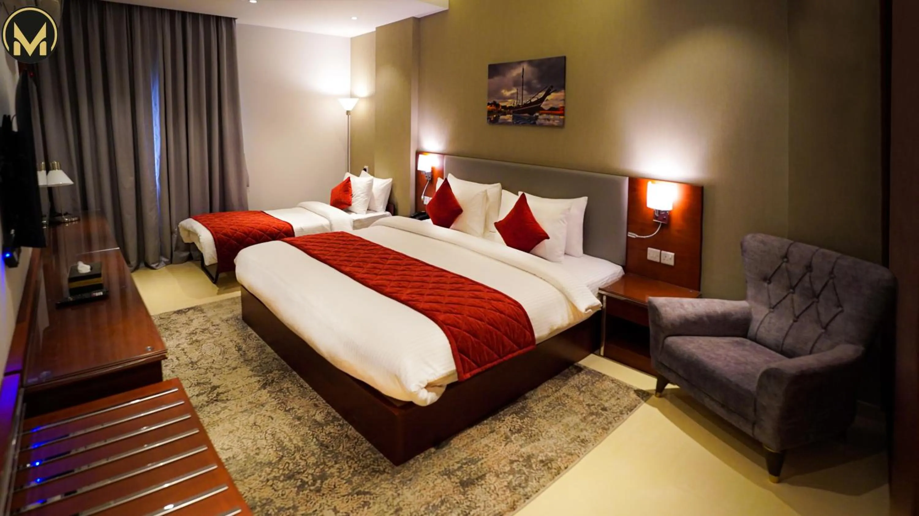 Bed in Muscat Express Hotel