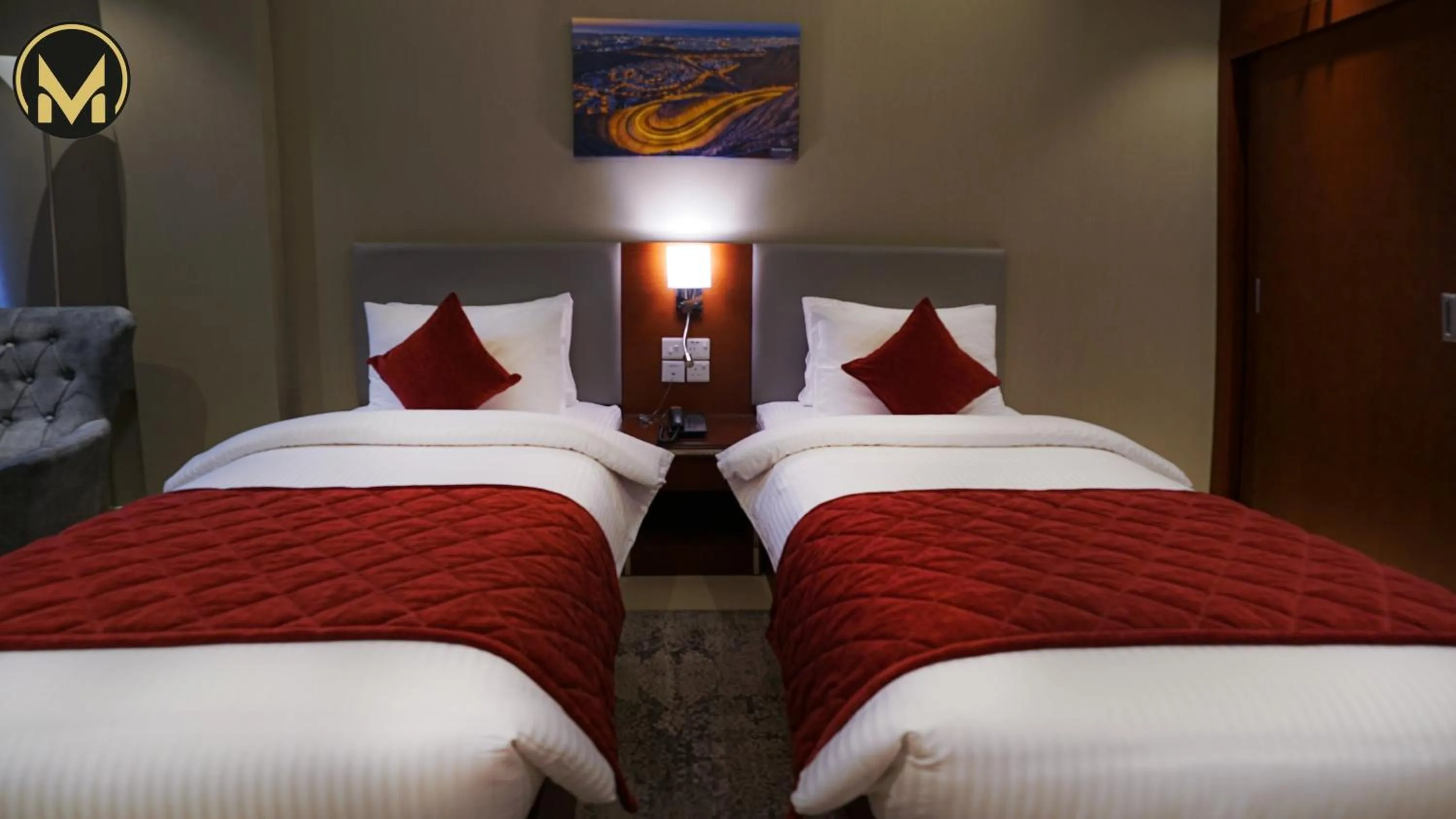 Bed in Muscat Express Hotel