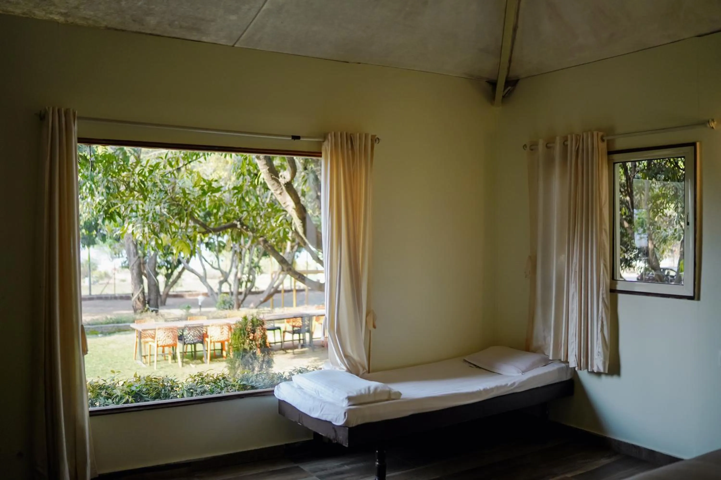 Bed in VIRASAT RESORT