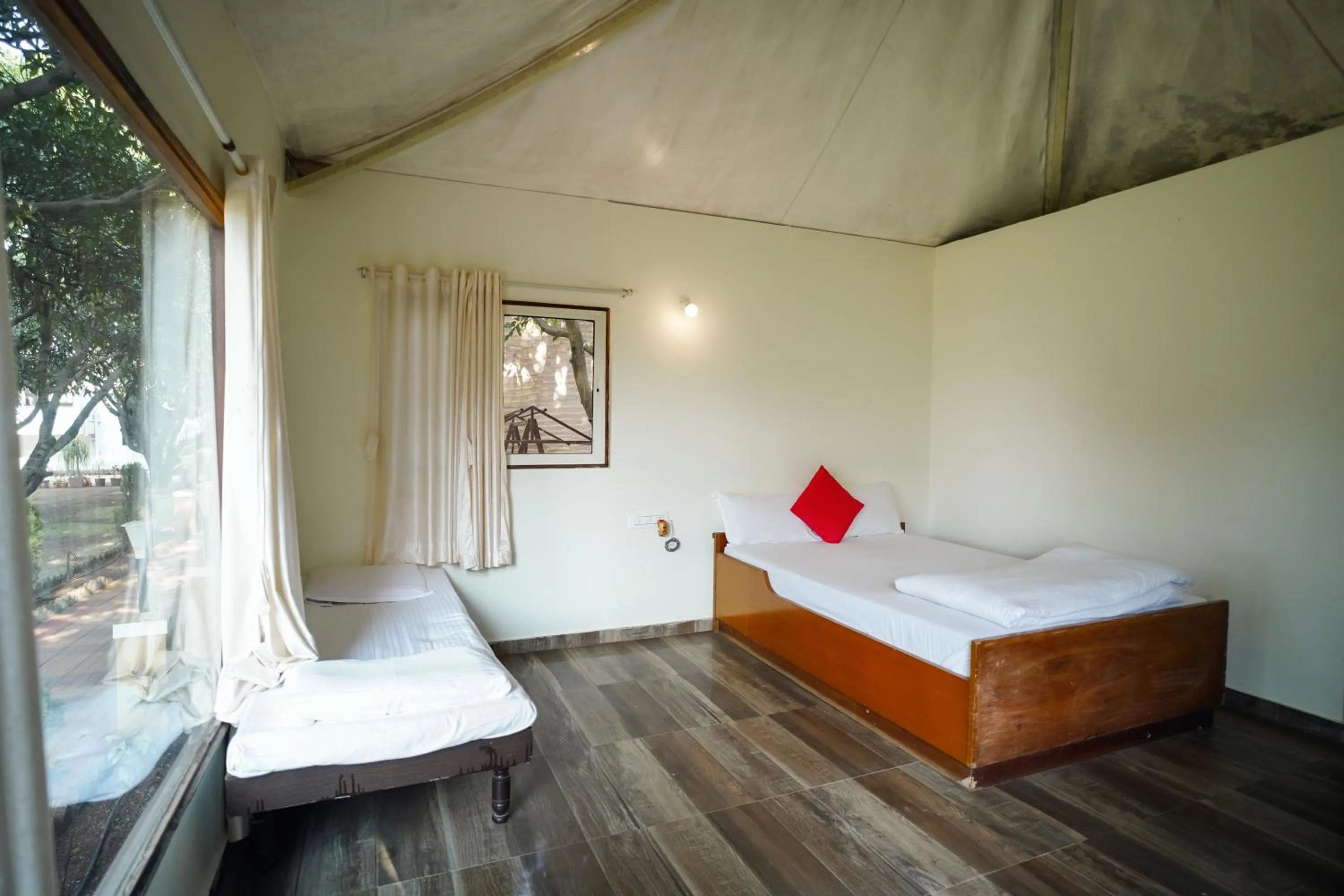 Bed in VIRASAT RESORT