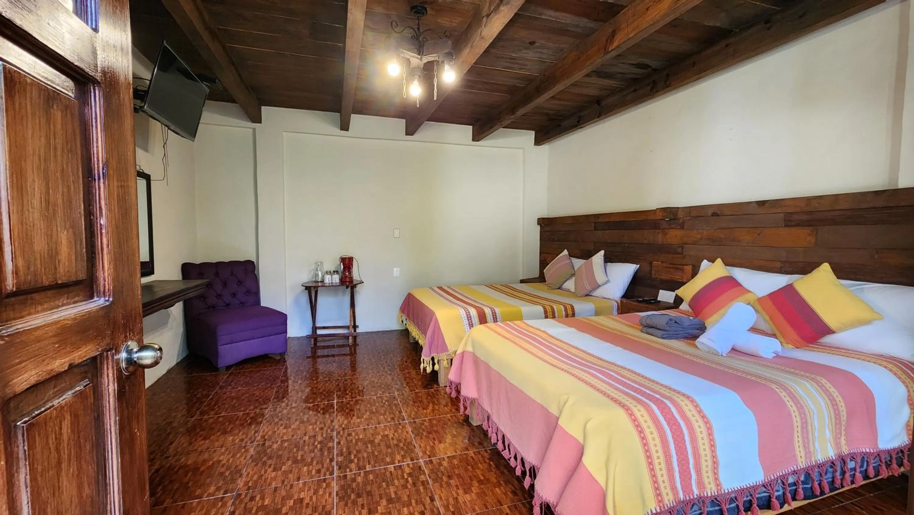 Bed in Arte Sano Hotel San Cristobal