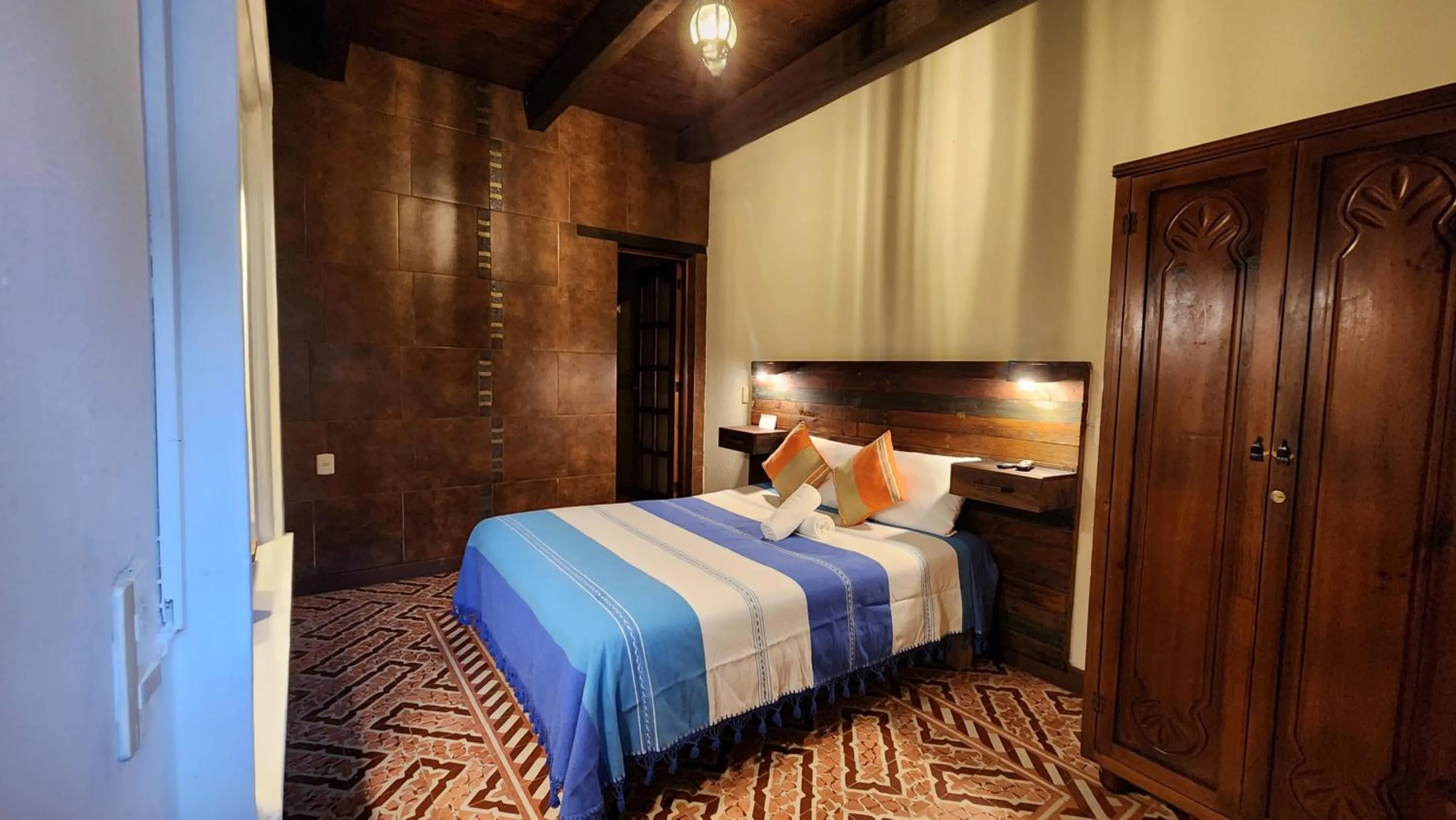 Bed in Arte Sano Hotel San Cristobal