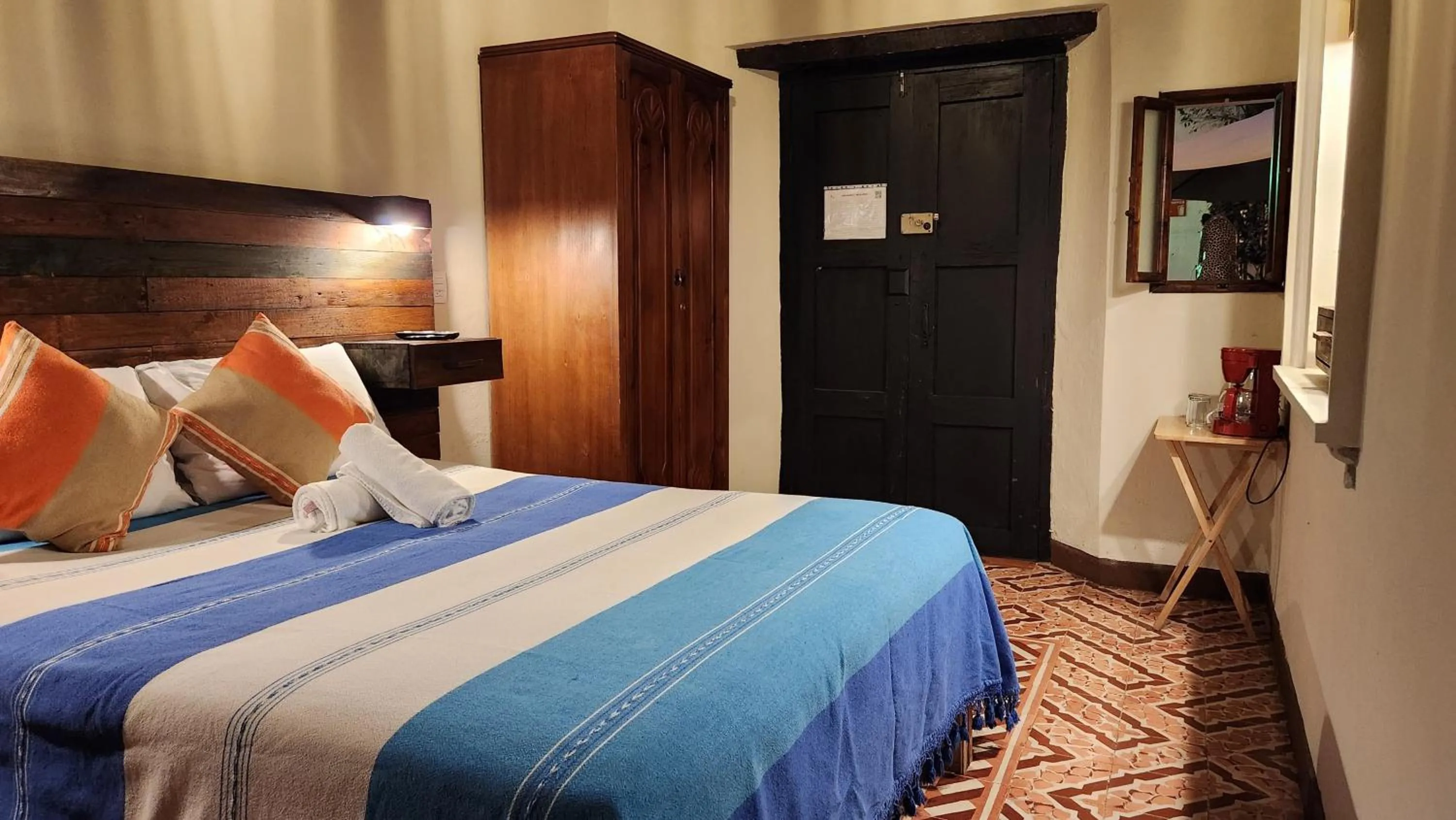 Bed in Arte Sano Hotel San Cristobal