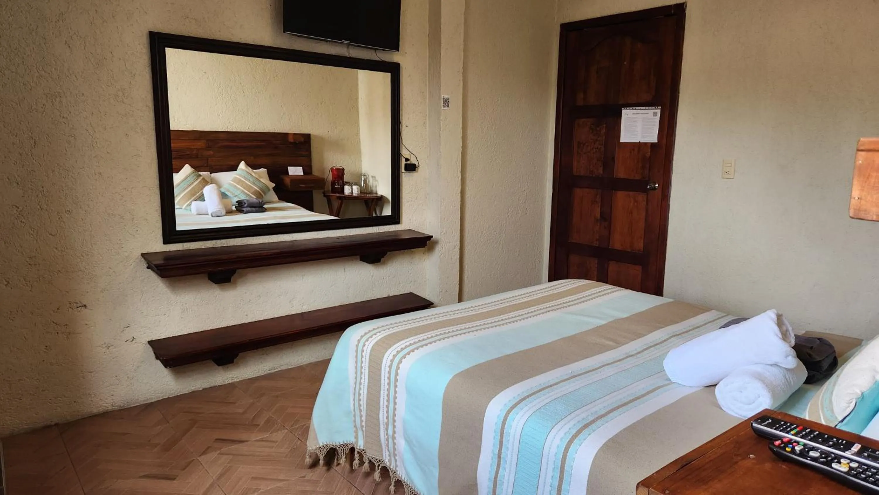 Photo of the whole room, Bed in Arte Sano Hotel San Cristobal