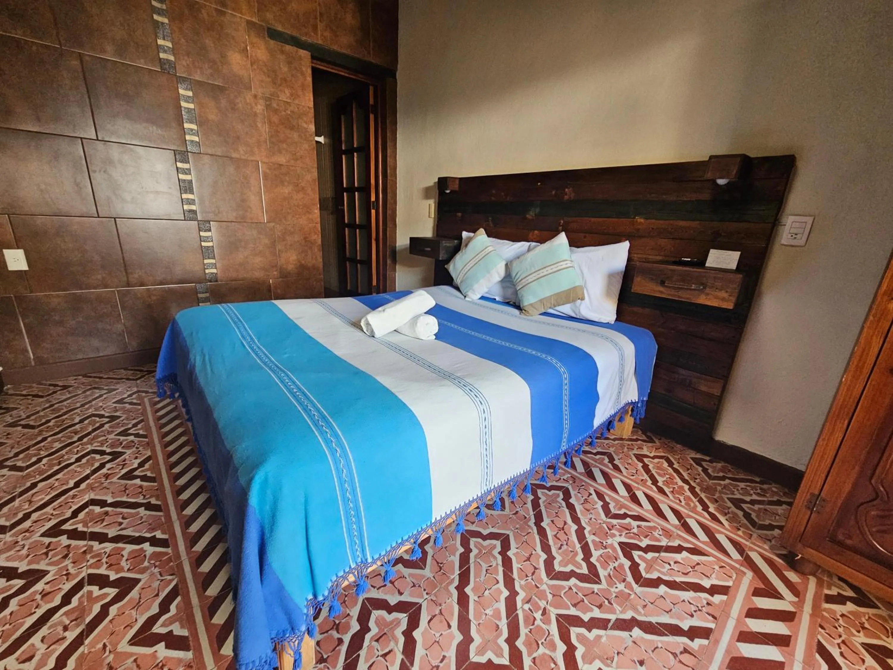 Bed in Arte Sano Hotel San Cristobal