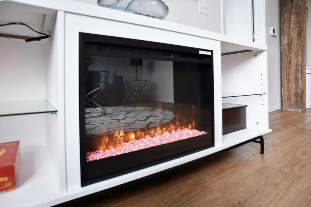 fireplace in Luxéry Stay Chicago - Themed Units! Close to Downtown, McCormick Place & Wintrust Arena