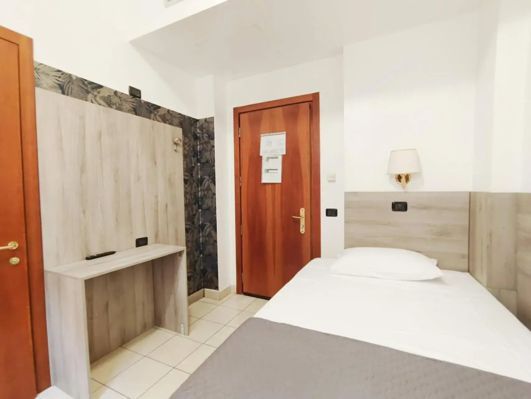 Bed in Hotel Mondial Bed in Hotel Mondial