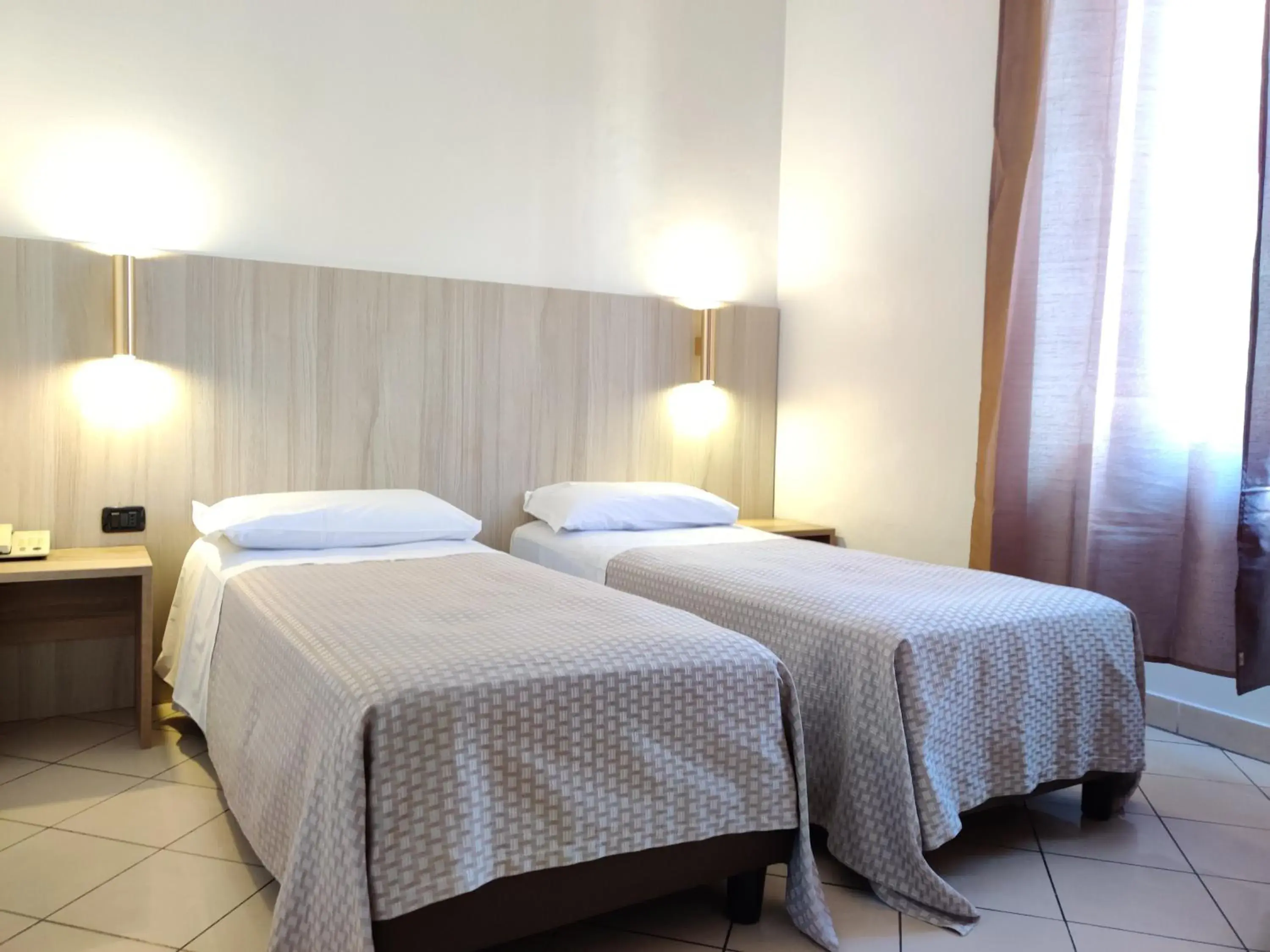 Bed in Hotel Mondial Bed in Hotel Mondial