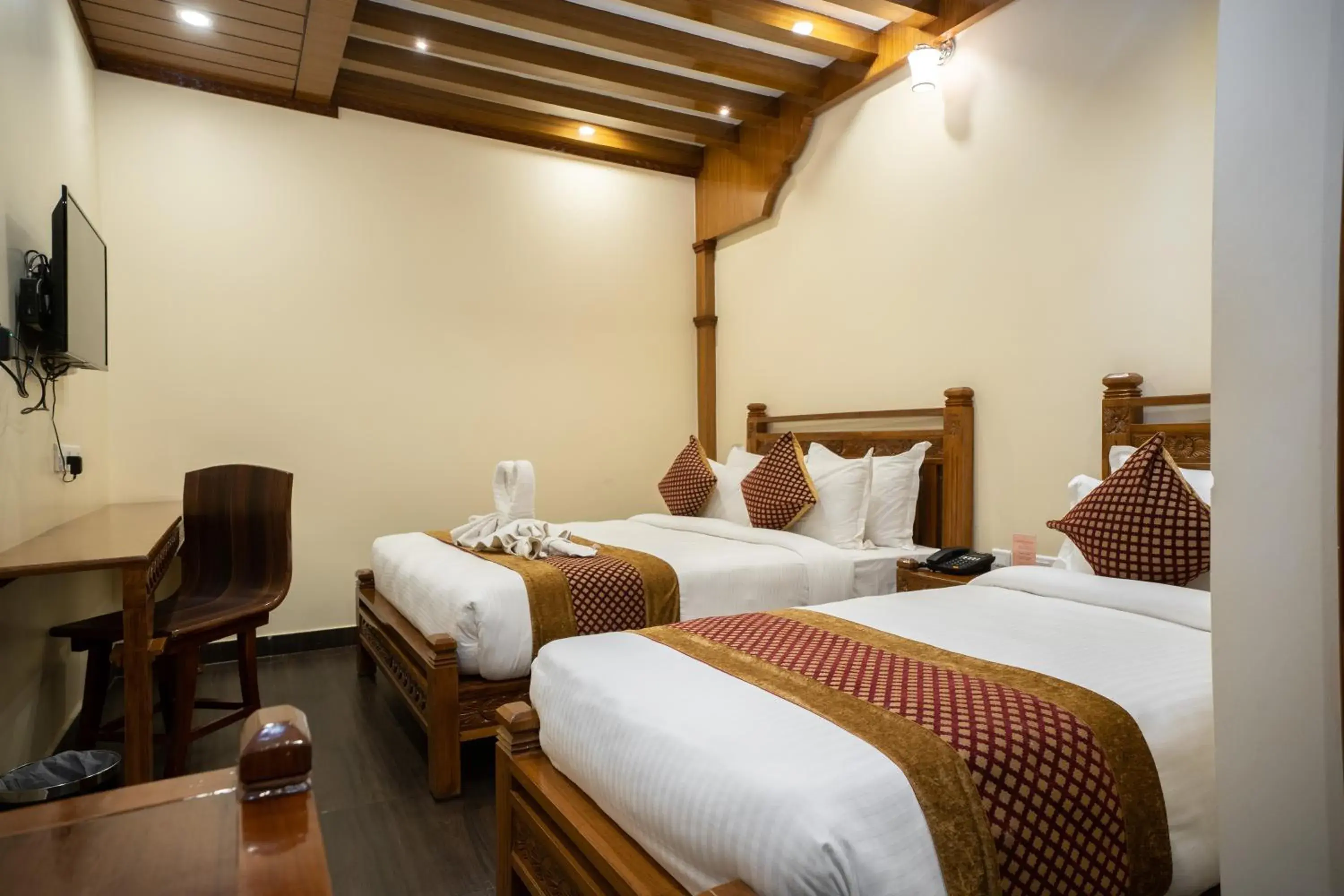 Bed in Surya Heritage Hotel Bed in Surya Heritage Hotel