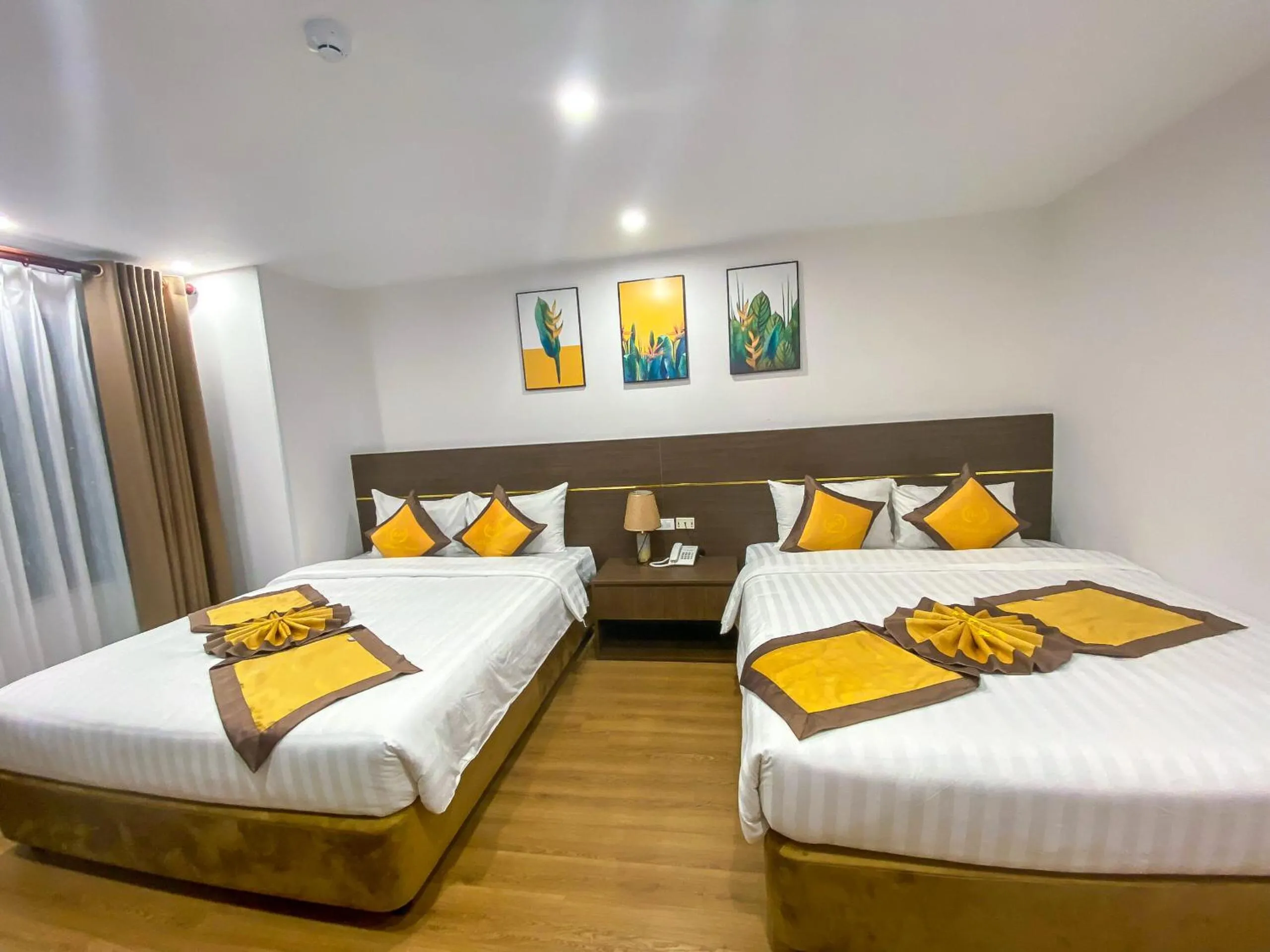 Bed in H&T Luxury Hotel