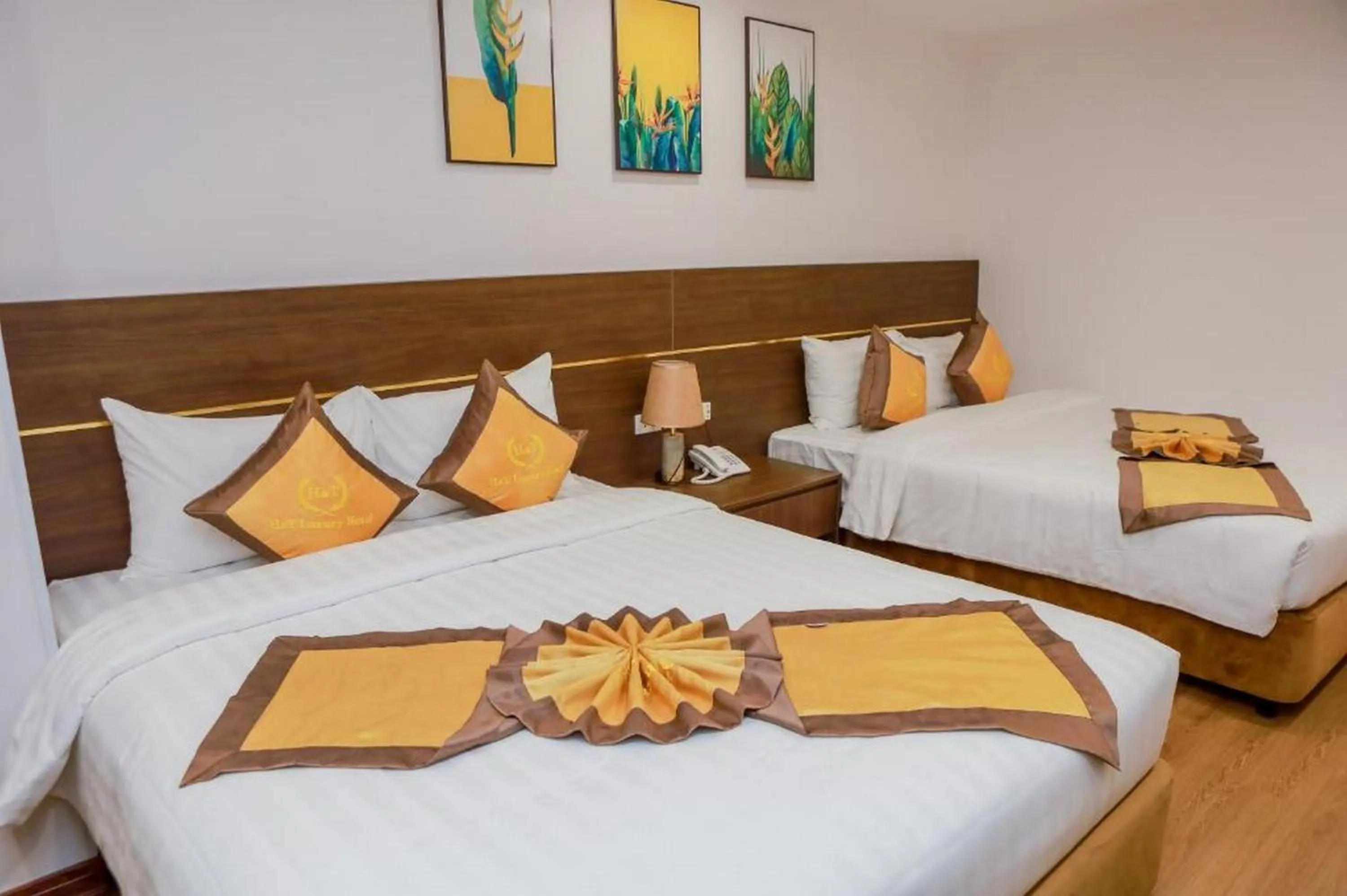 Bed in H&T Luxury Hotel