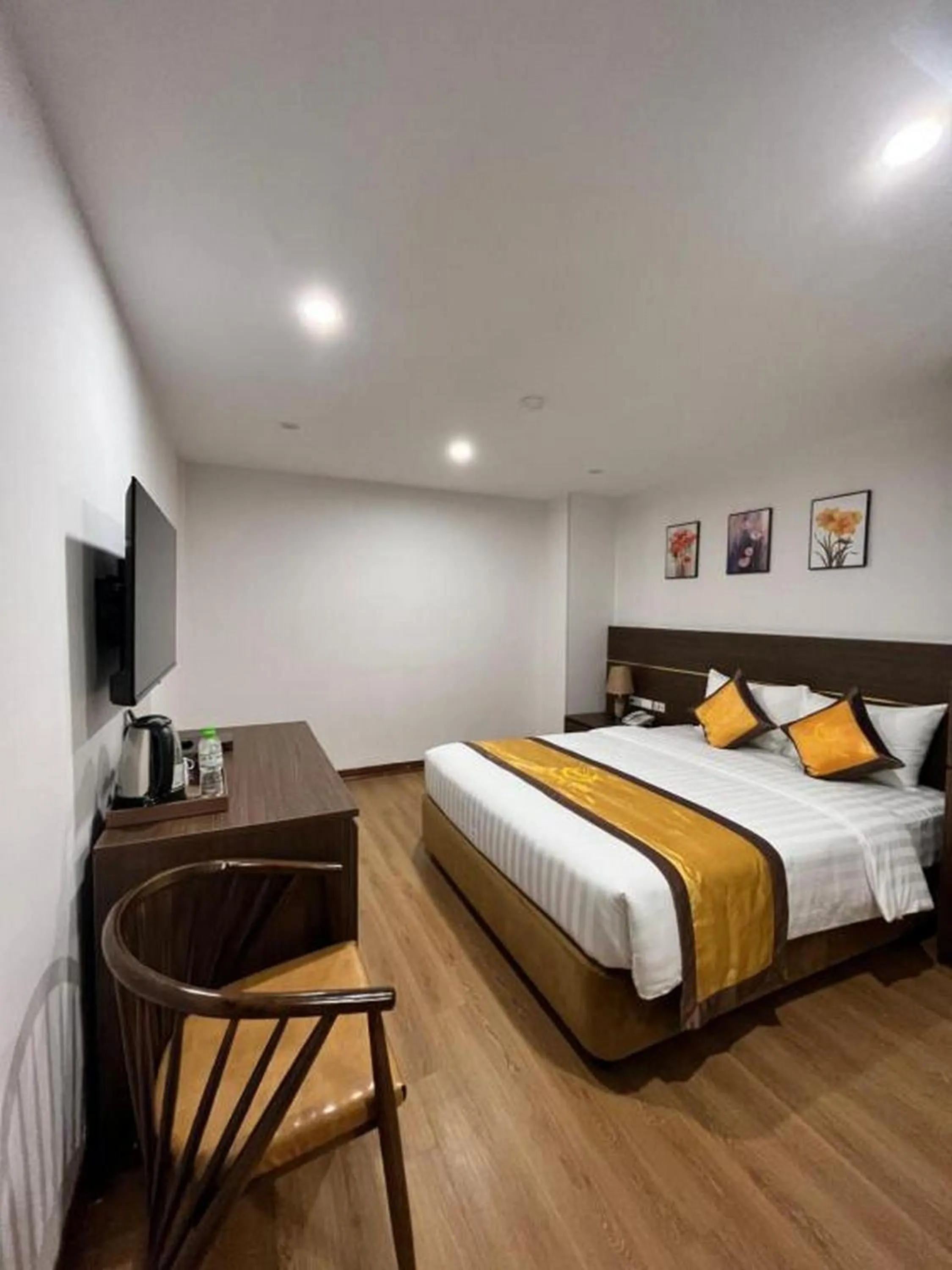 Bed in H&T Luxury Hotel
