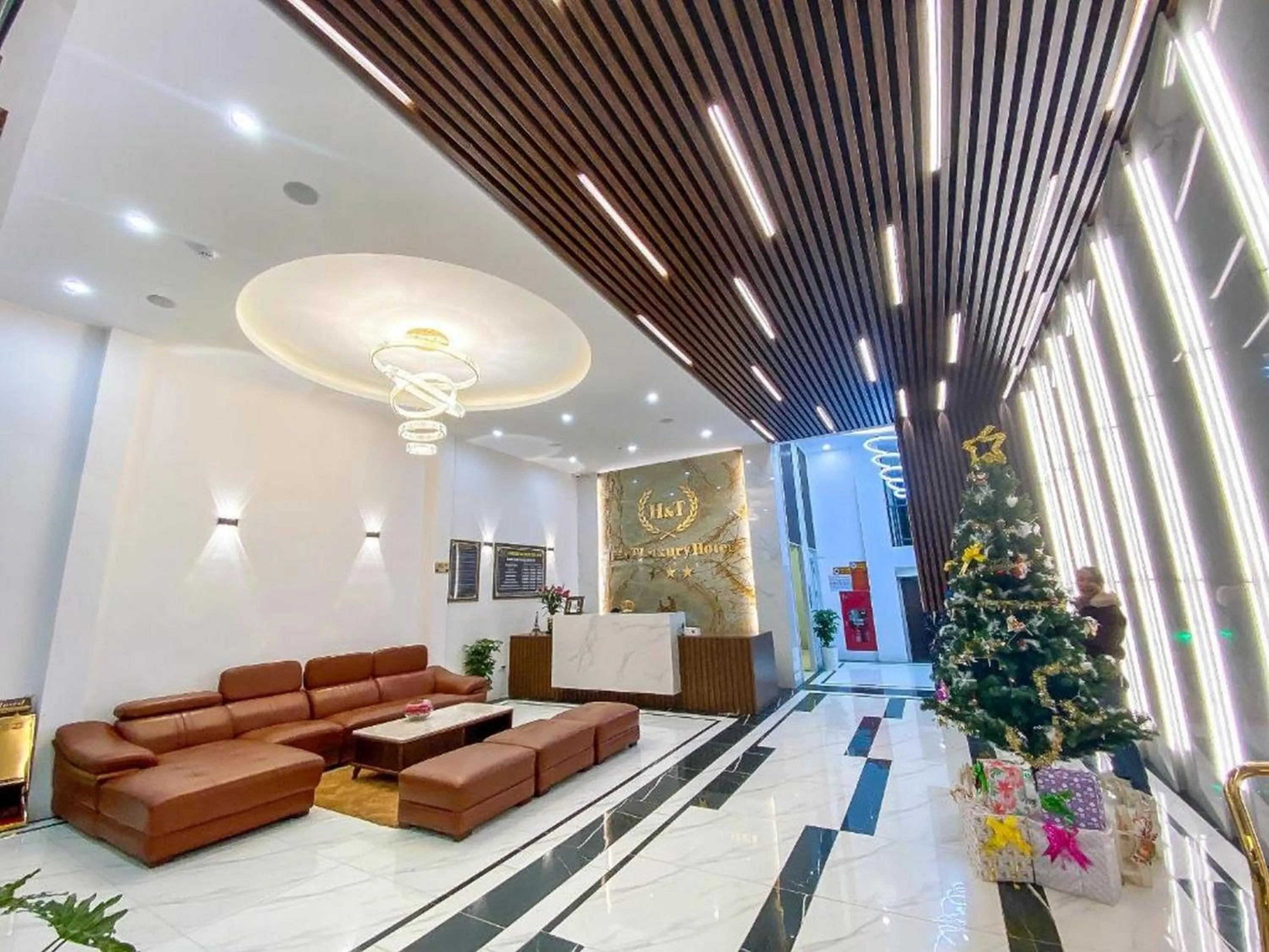 Lobby or reception in H&T Luxury Hotel
