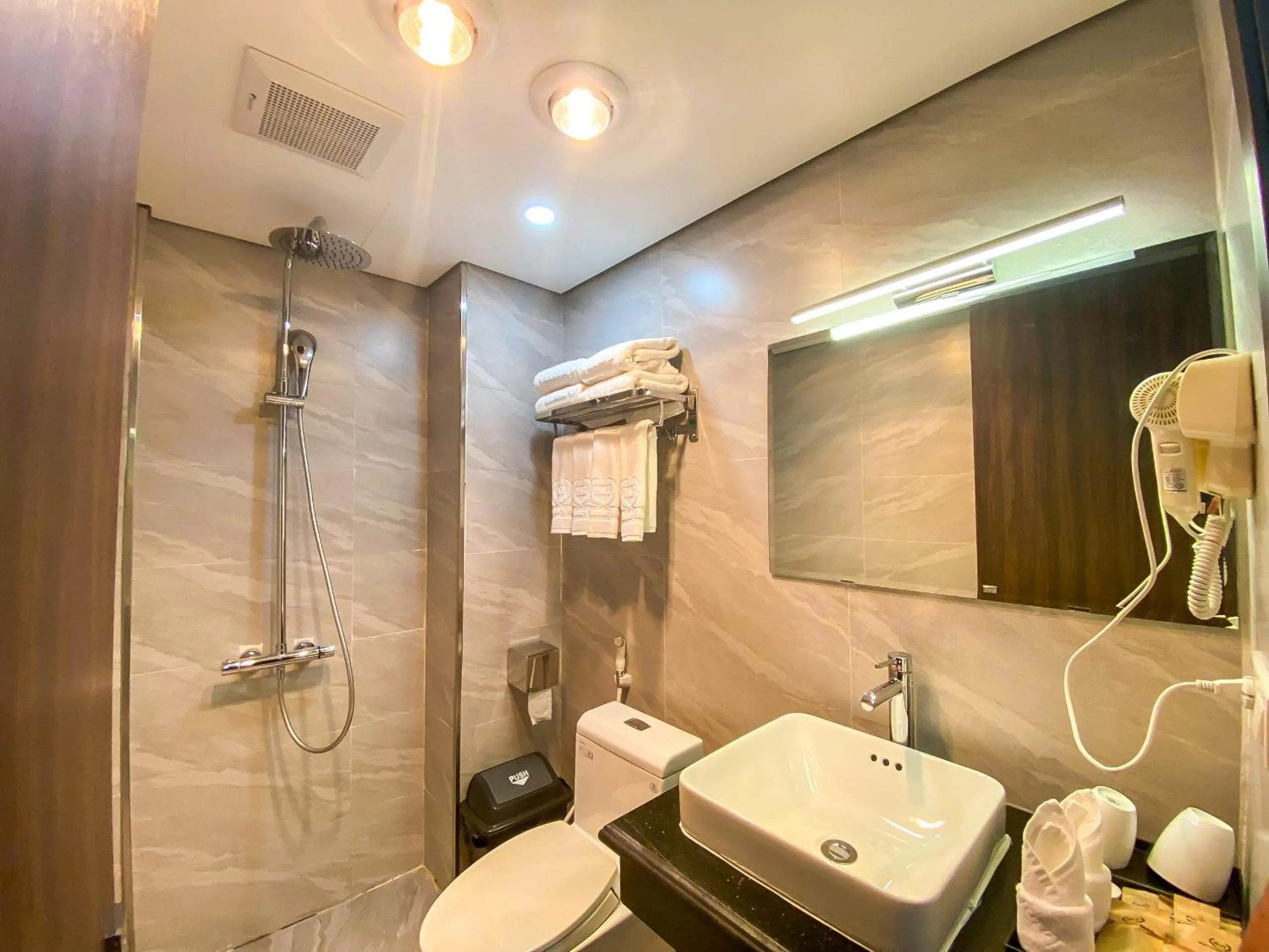 Shower in H&T Luxury Hotel