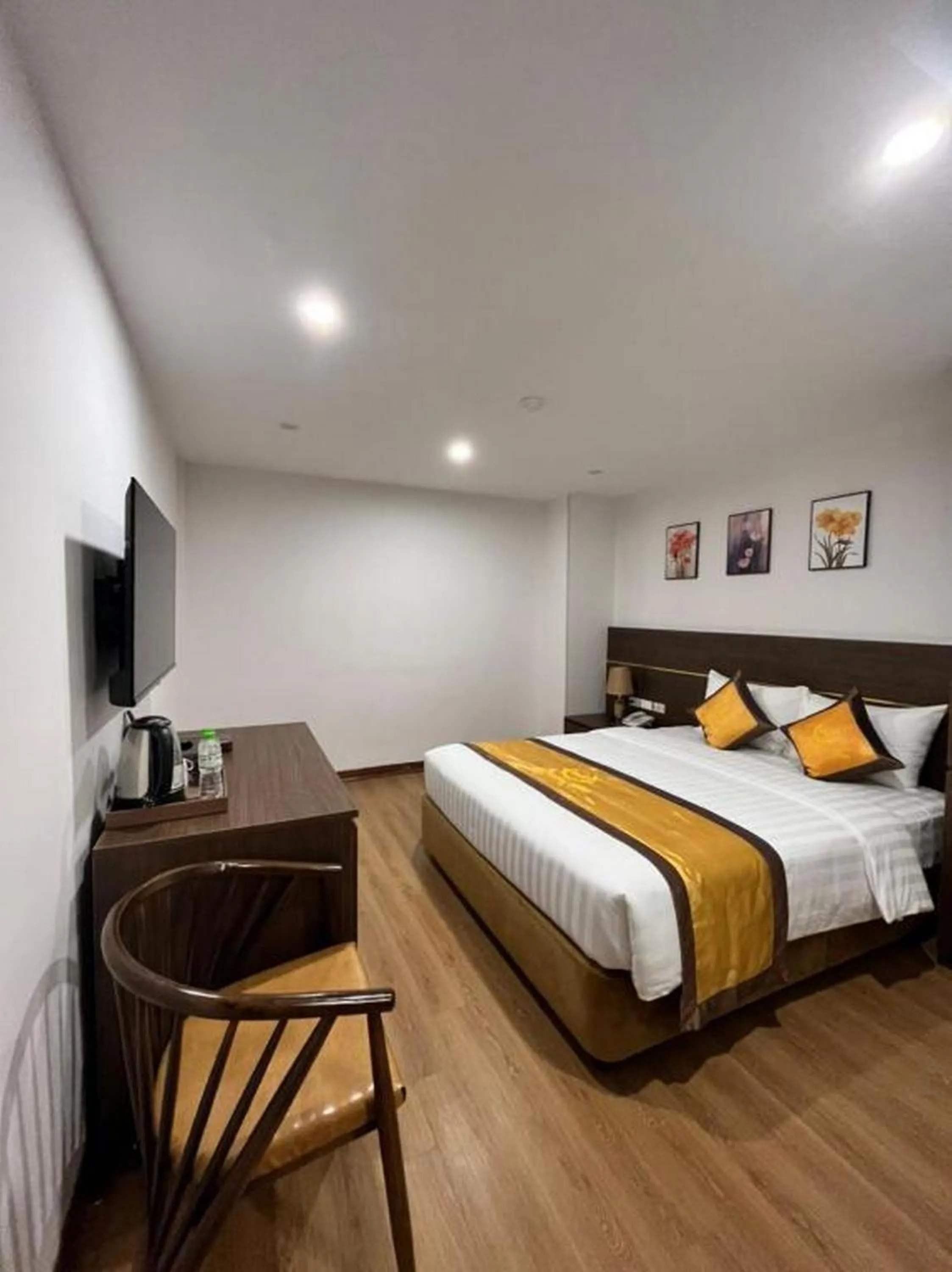 Bed in H&T Luxury Hotel