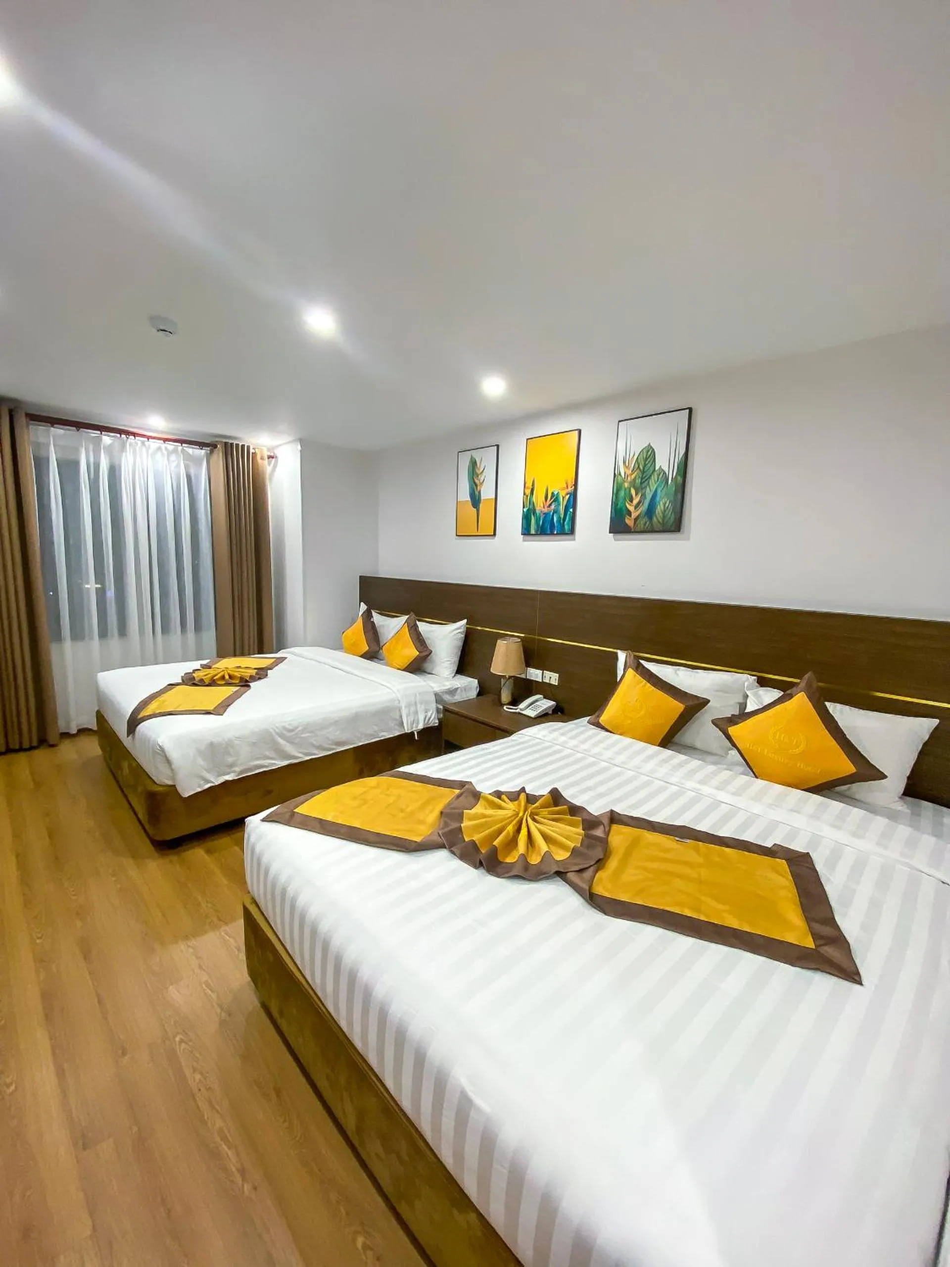Bed in H&T Luxury Hotel