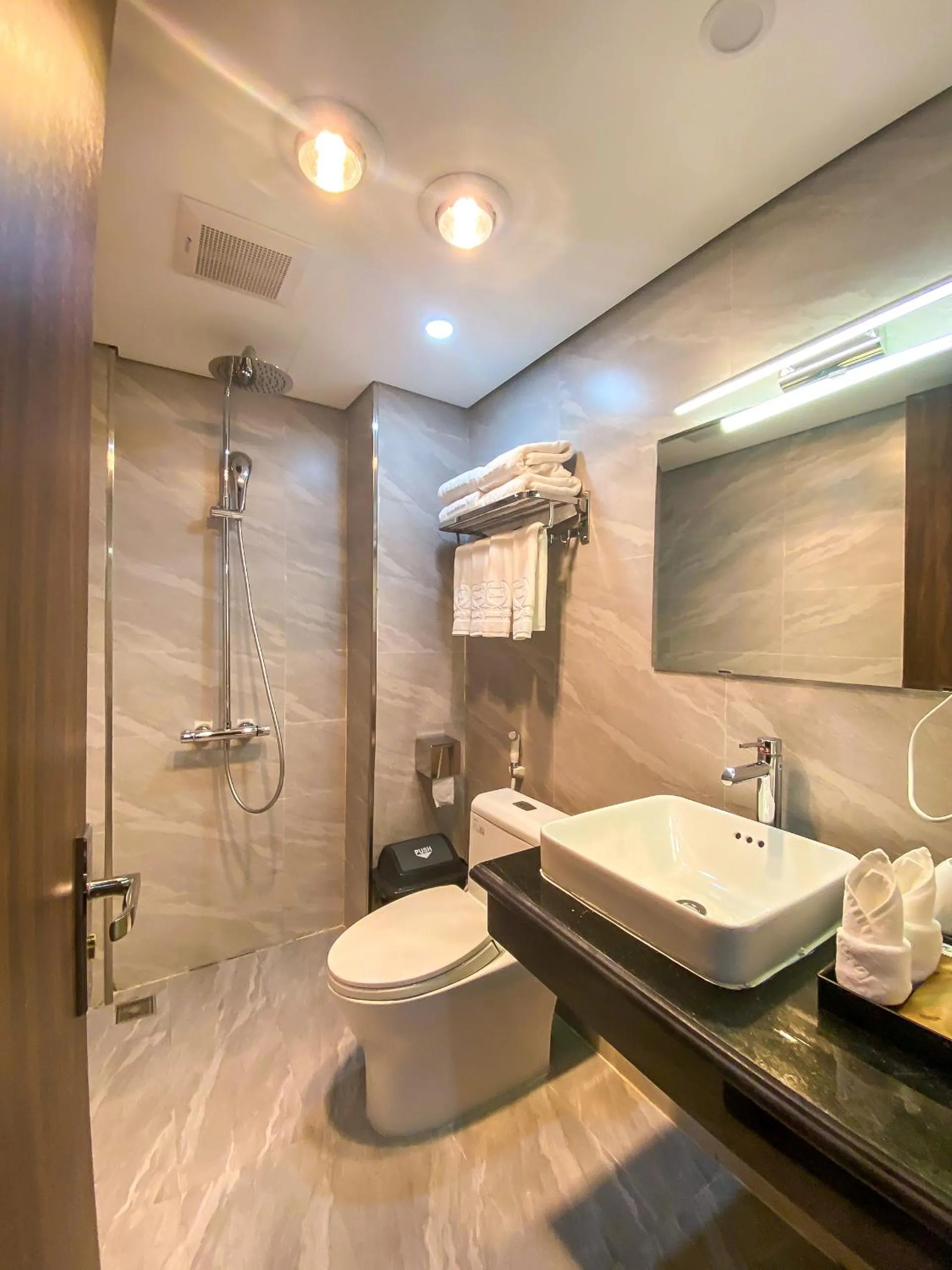 Shower in H&T Luxury Hotel