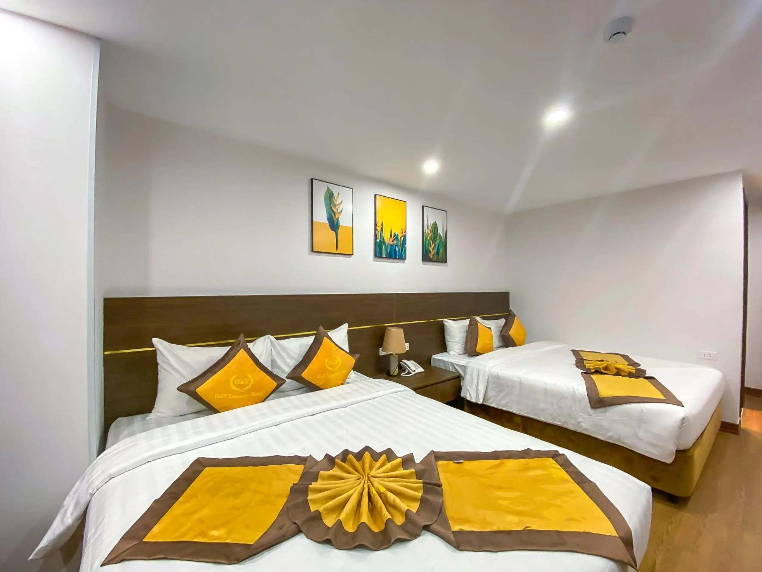 Bed in H&T Luxury Hotel