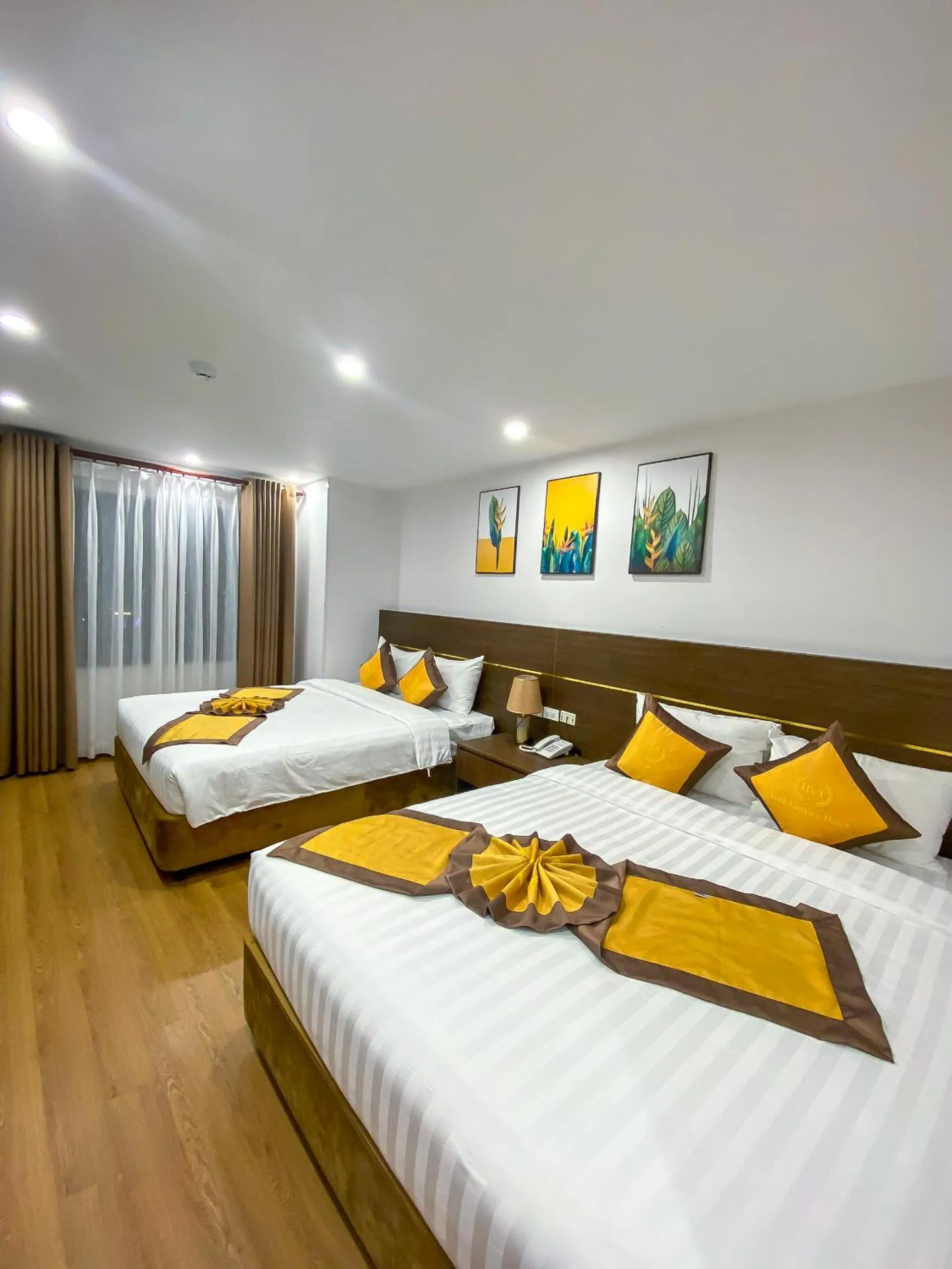 Bed in H&T Luxury Hotel