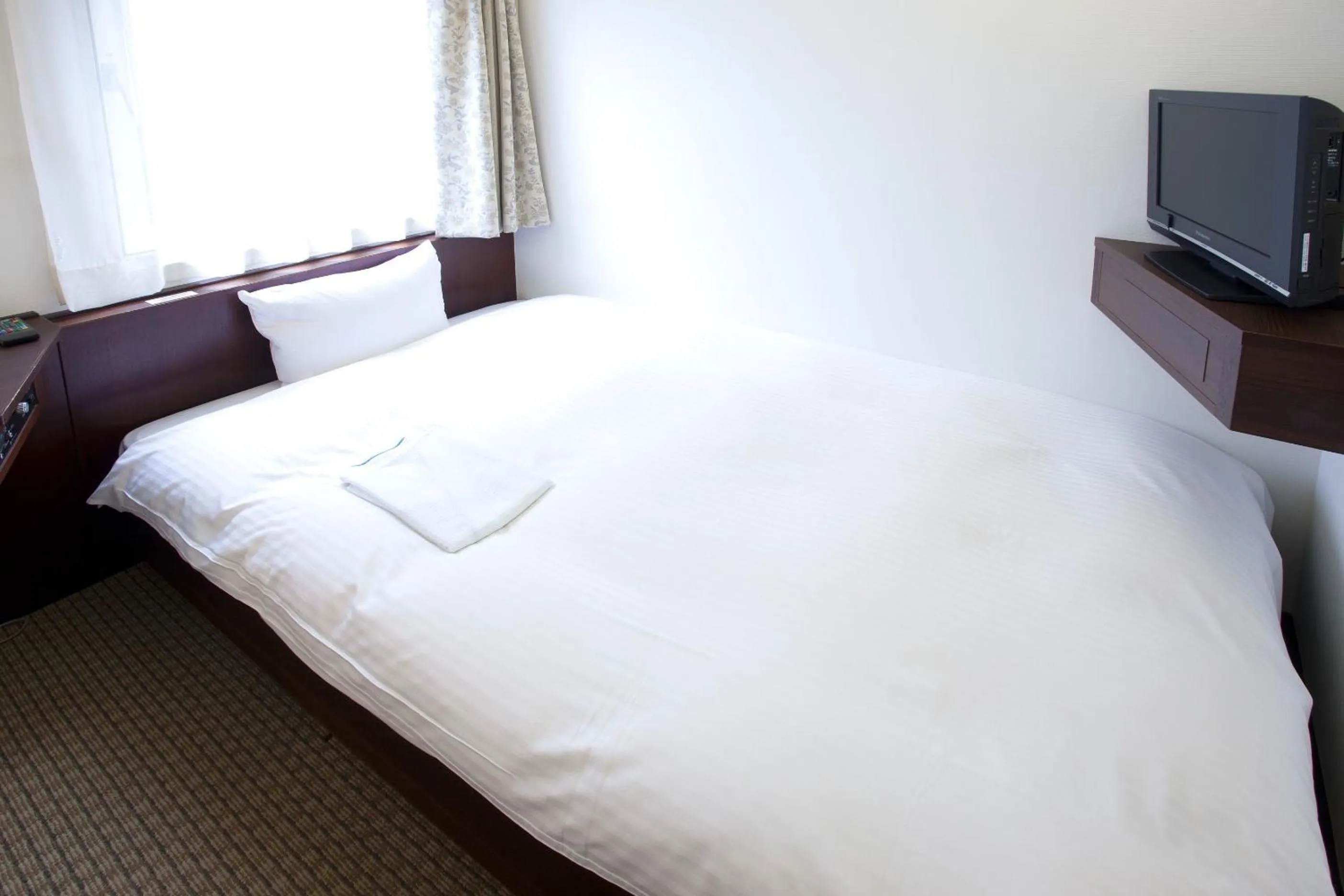 Bed in Pearl Hotel Kayabacho