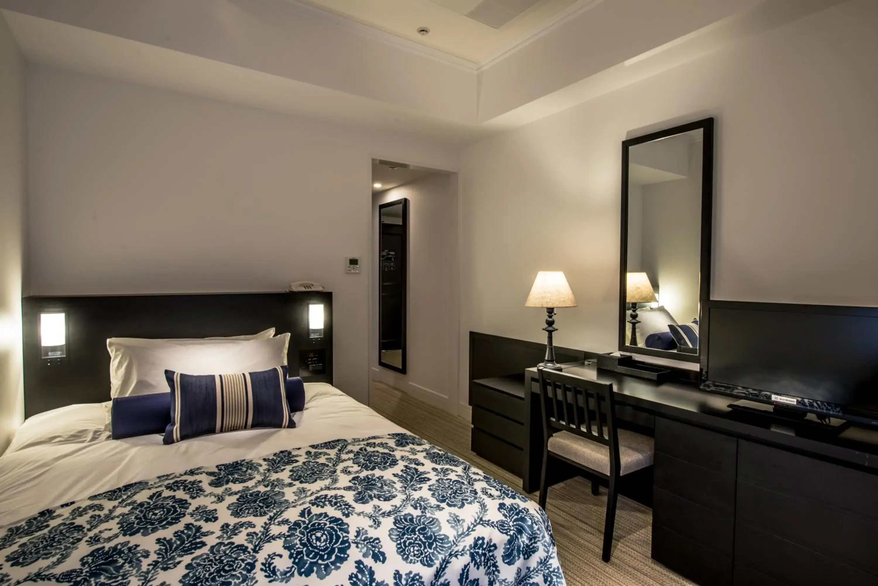 Bed in Hotel Monterey Okinawa Spa & Resort Bed in Hotel Monterey Okinawa Spa & Resort