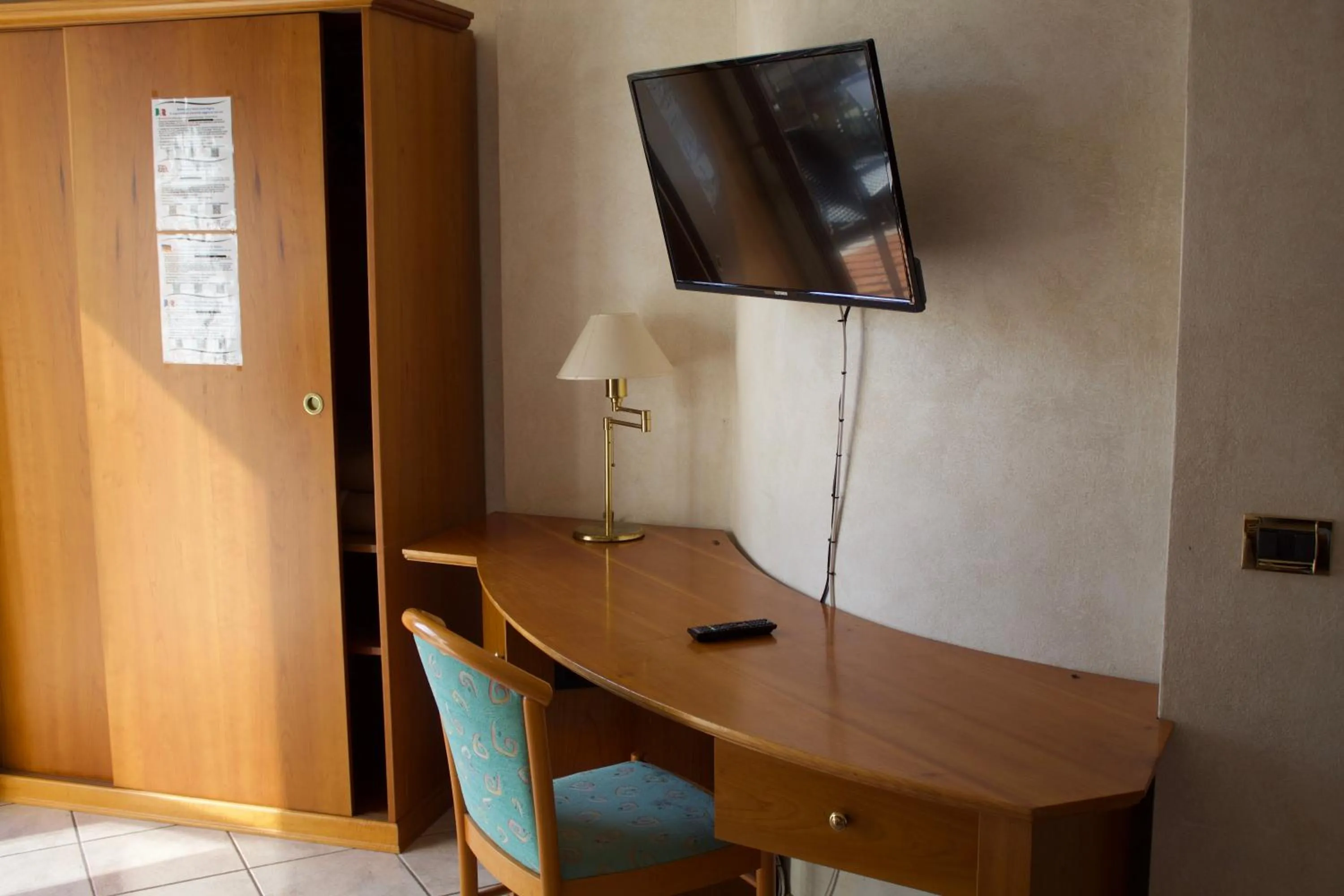 Communal lounge/ TV room in Hotel Corte Regina