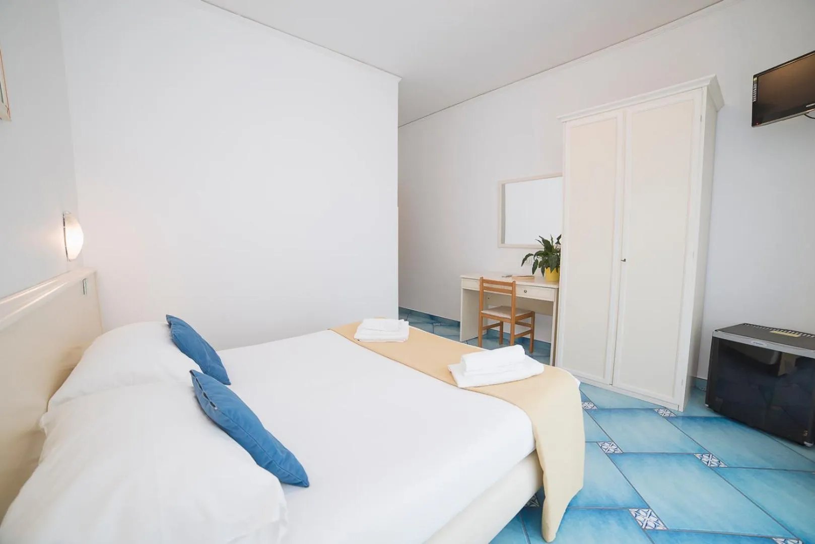 Bed in Hotel De Rosa