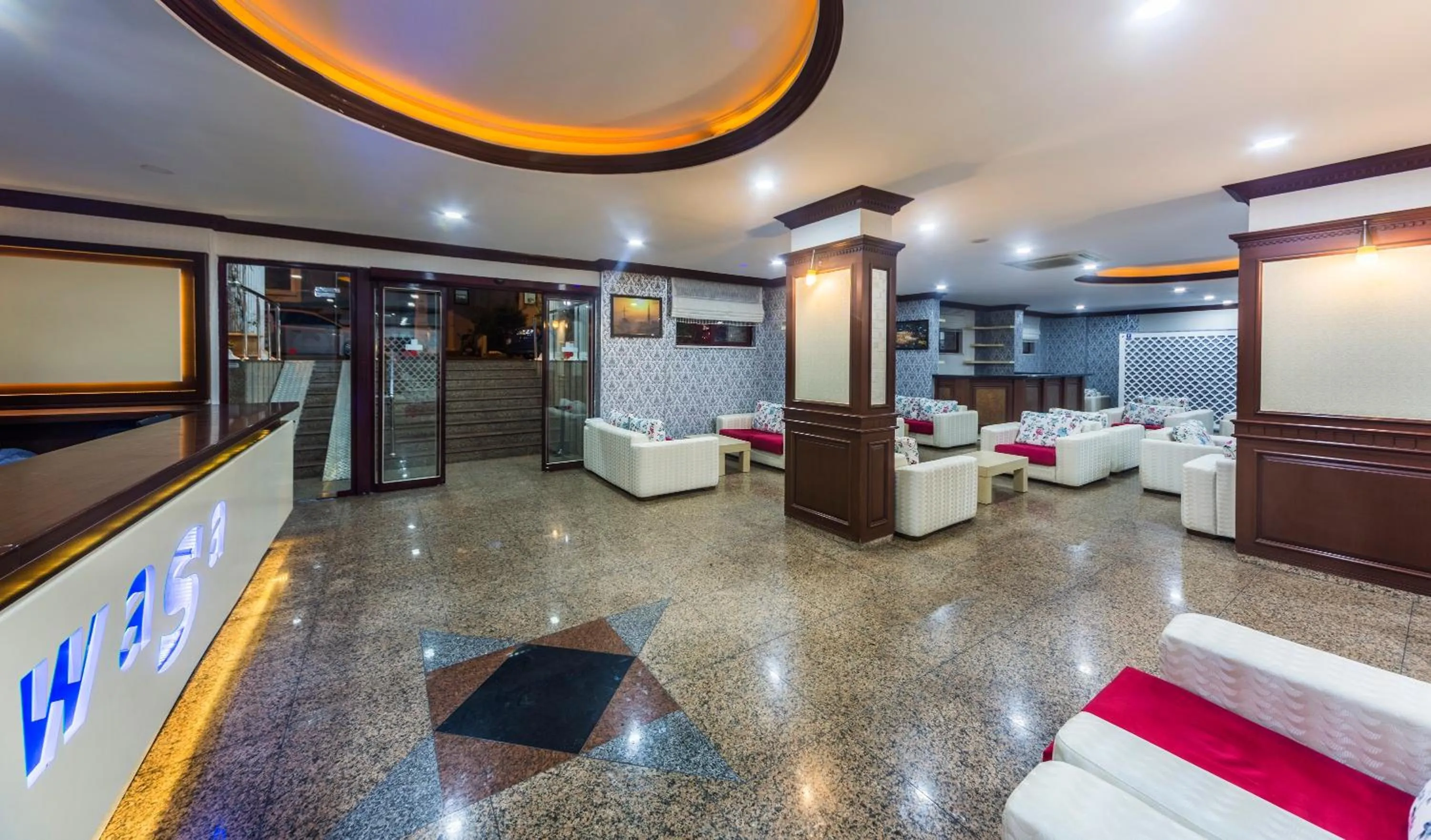 Communal lounge/ TV room in Wasa Hotel