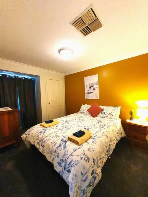 Bedroom, Bed in Adorable-secure 3 bedroom holiday home with Pool around the corner from The Miners Rest.
