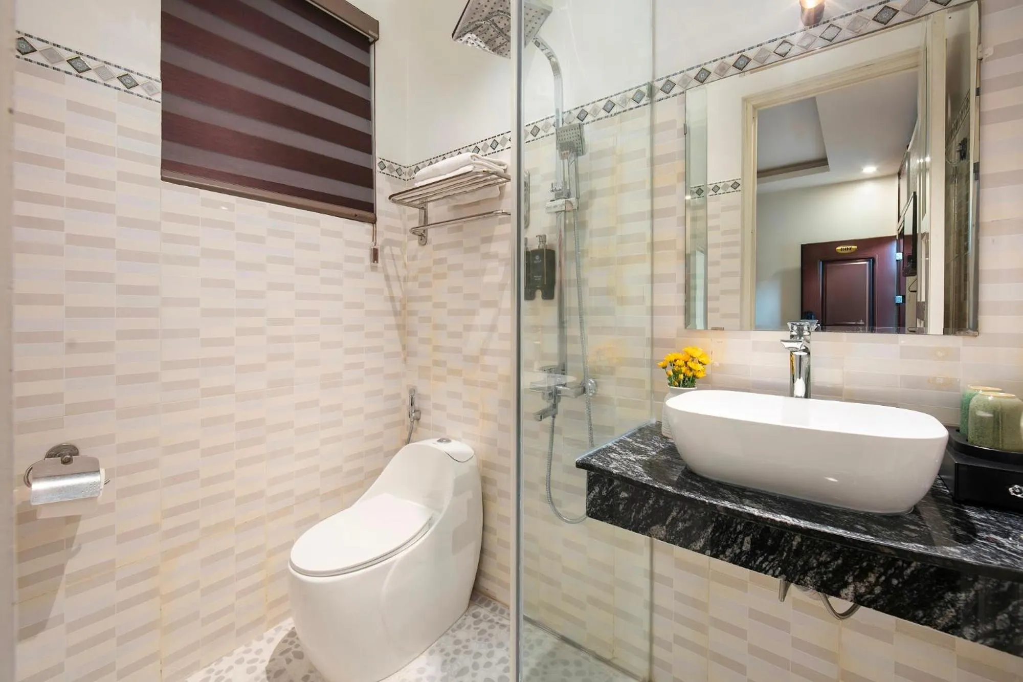 Bathroom in Delica Premium Hotel