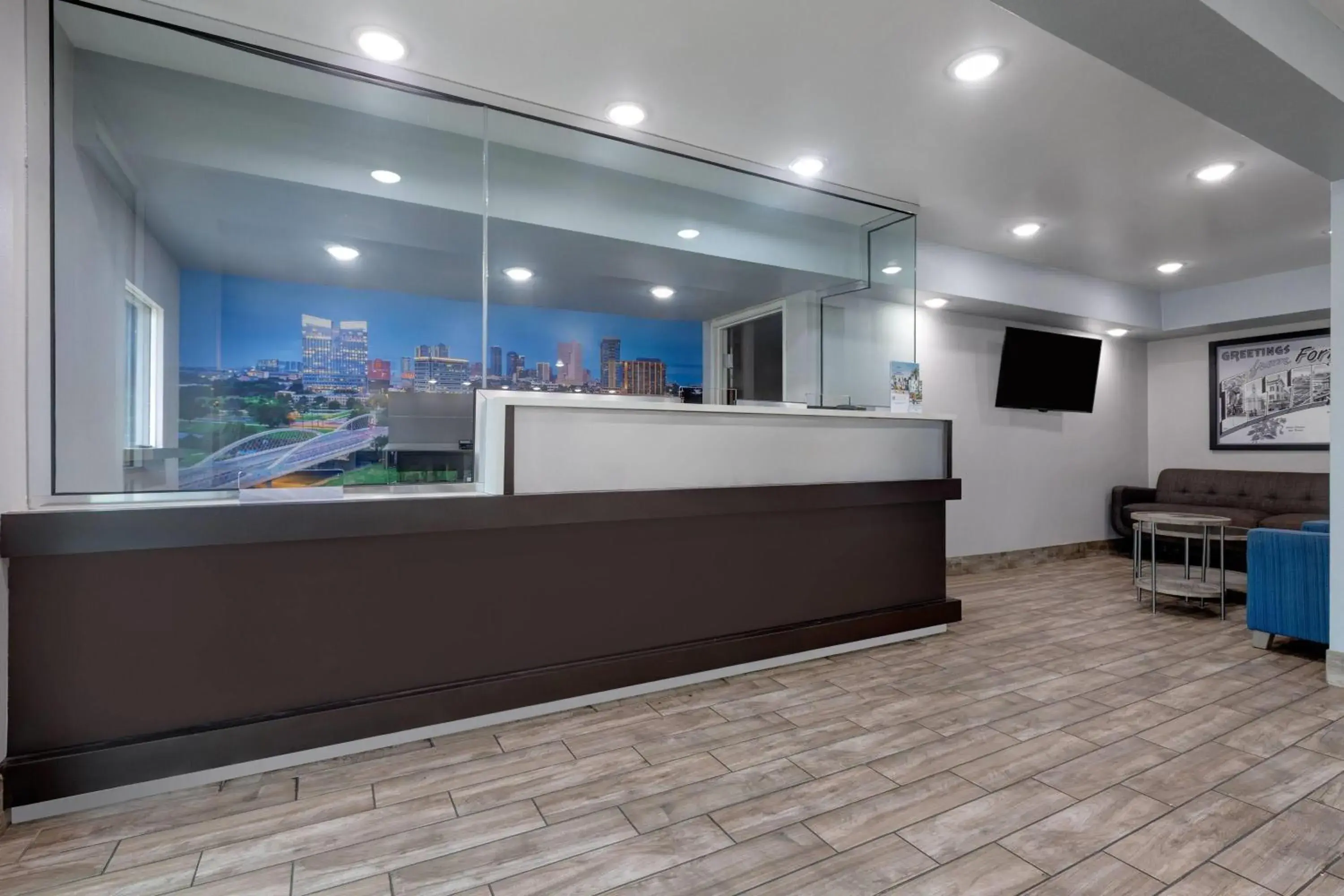 Lobby or reception in Super 8 by Wyndham Fort Worth Entertainment District Lobby or reception in Super 8 by Wyndham Fort Worth Entertainment District