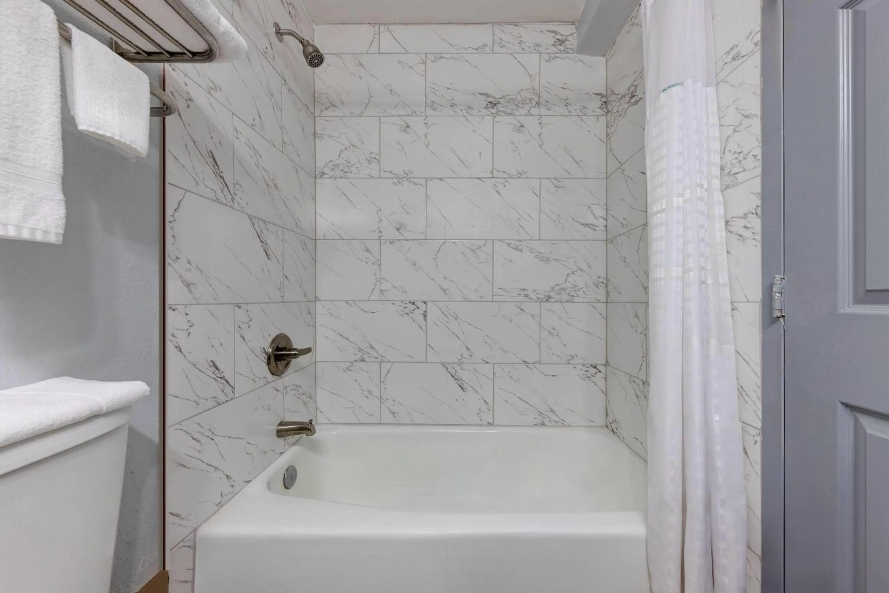 Bathroom in Super 8 by Wyndham Fort Worth Entertainment District