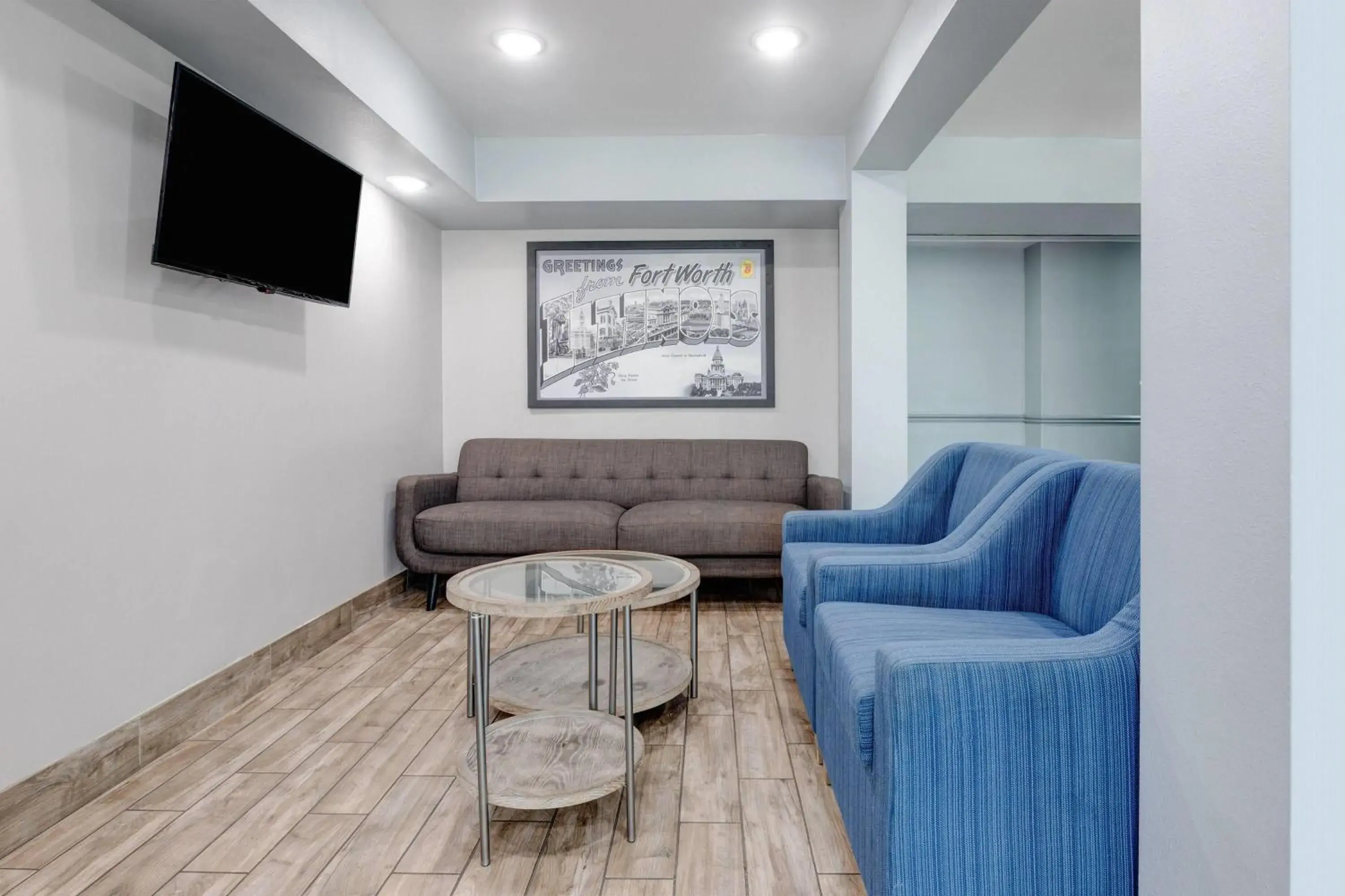 Lobby or reception in Super 8 by Wyndham Fort Worth Entertainment District Lobby or reception in Super 8 by Wyndham Fort Worth Entertainment District