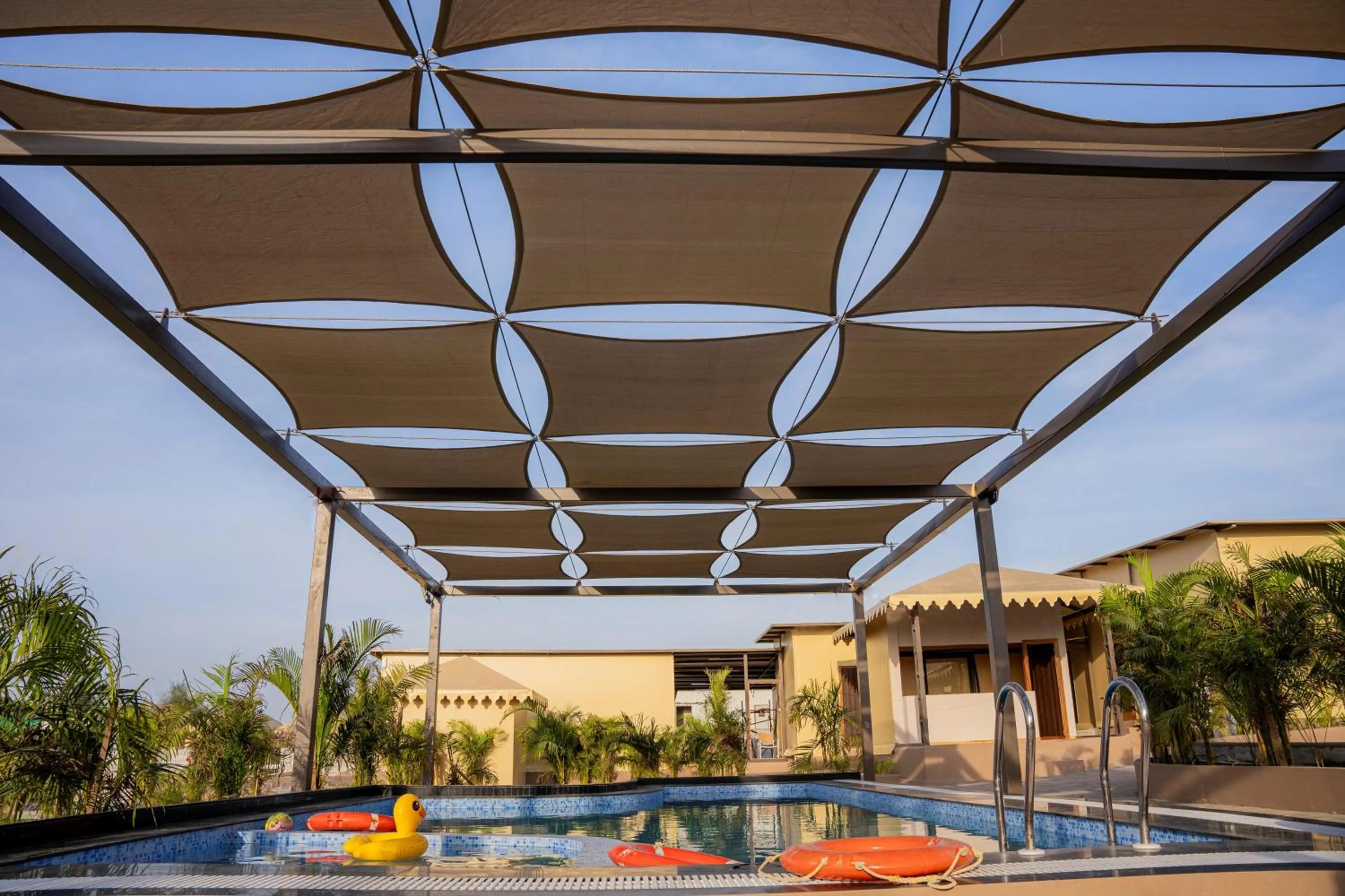 Swimming pool in The Fern Seaside Luxurious Tent Resort Diu