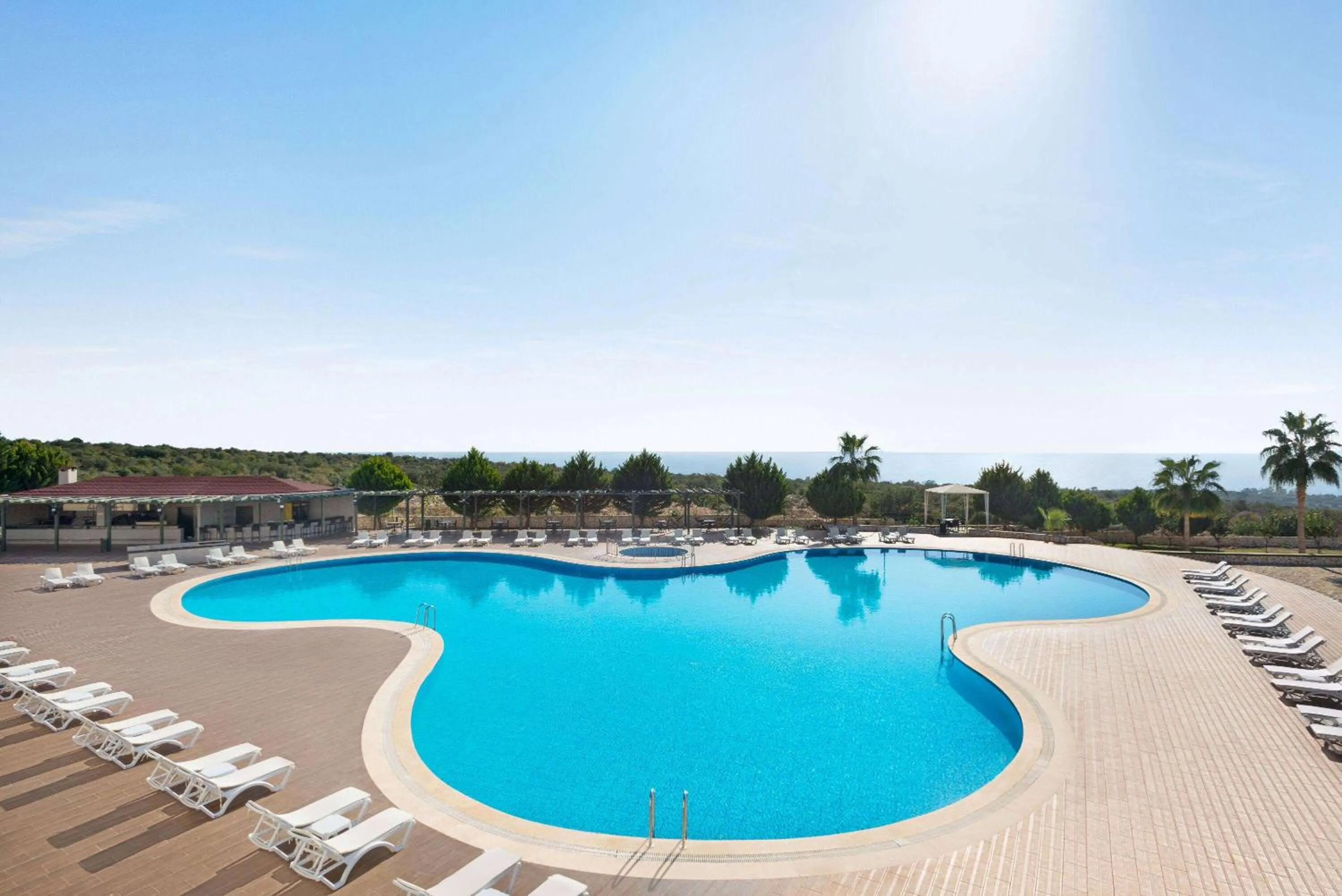 Swimming pool in Ramada Resort By Wyndham Kizkalesi