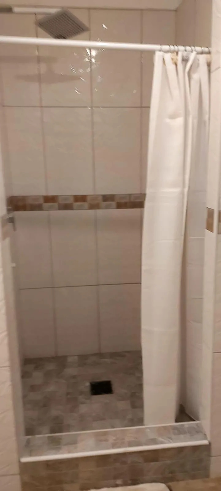 Shower in Amazing Beach View Apartments