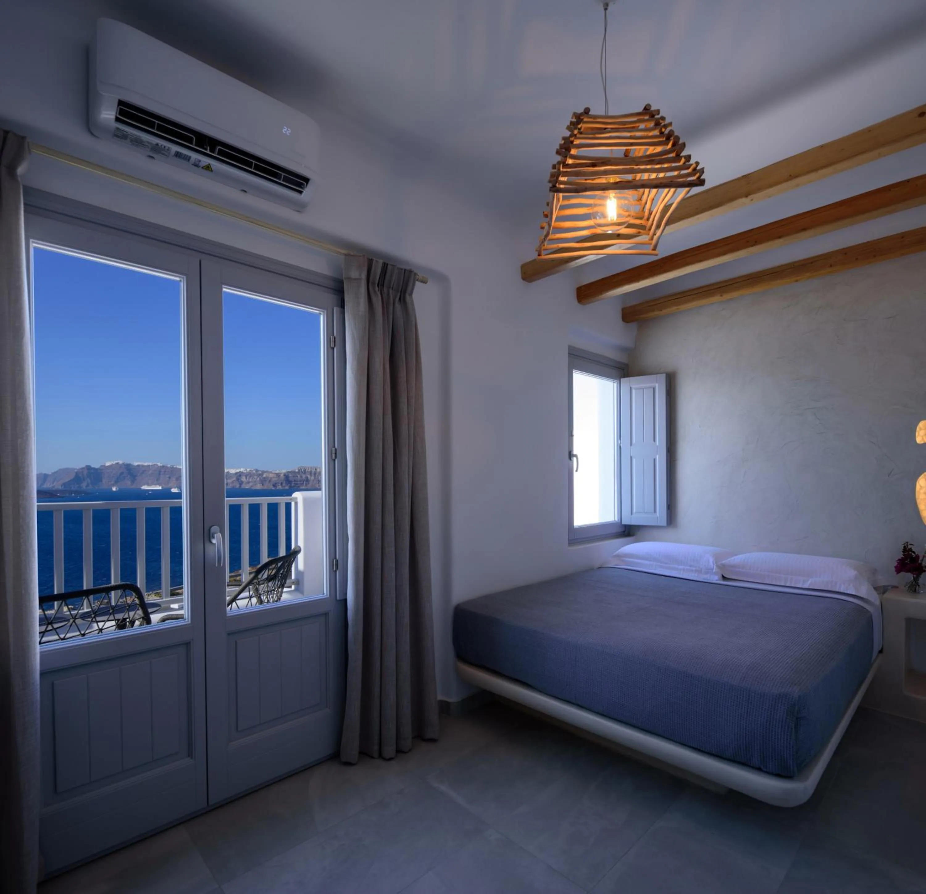 Photo of the whole room, Bed in Acro Blue Luxury Villas