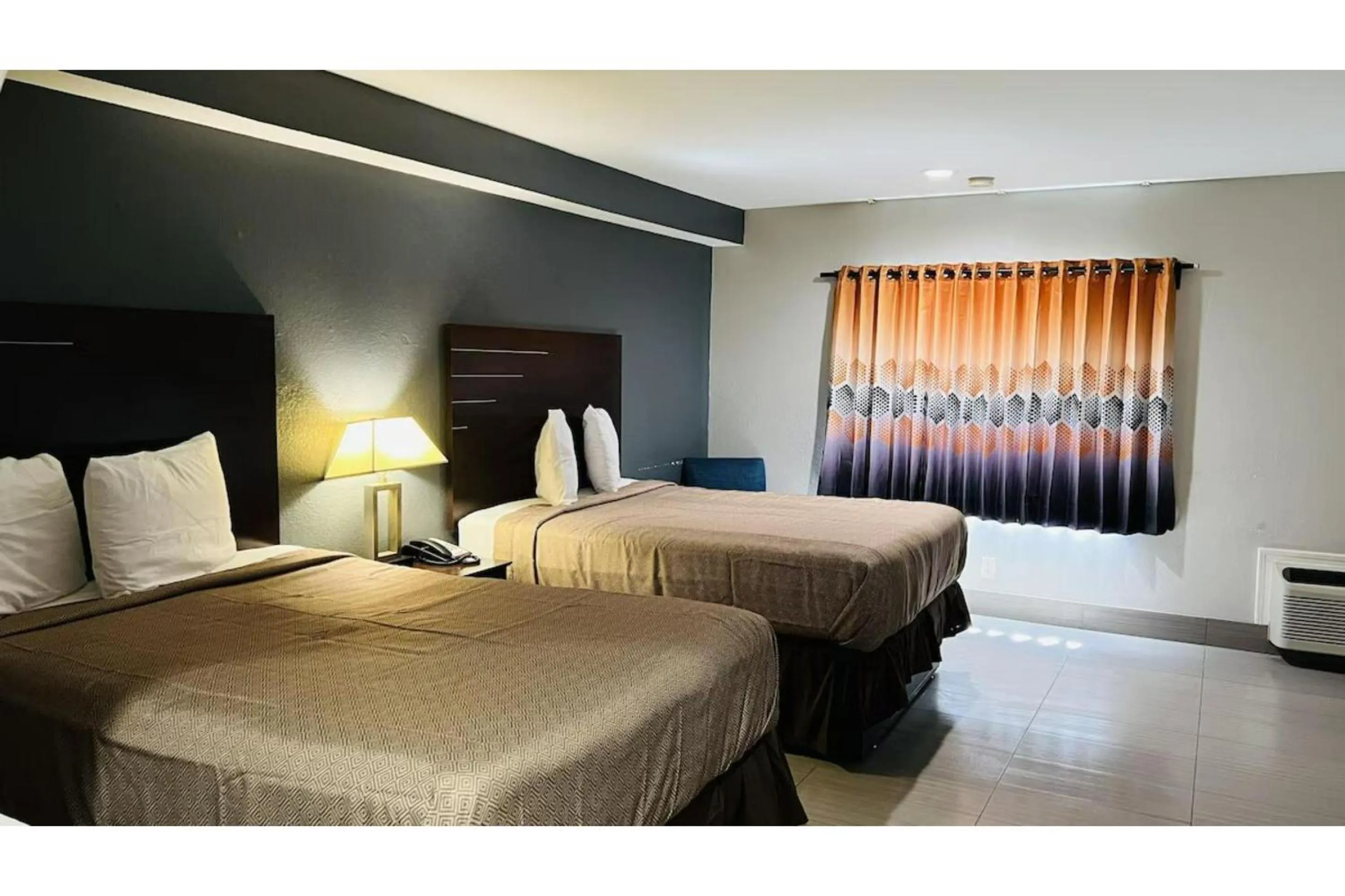 Bedroom, Bed in Regency Inn & Suites Houston East I 10