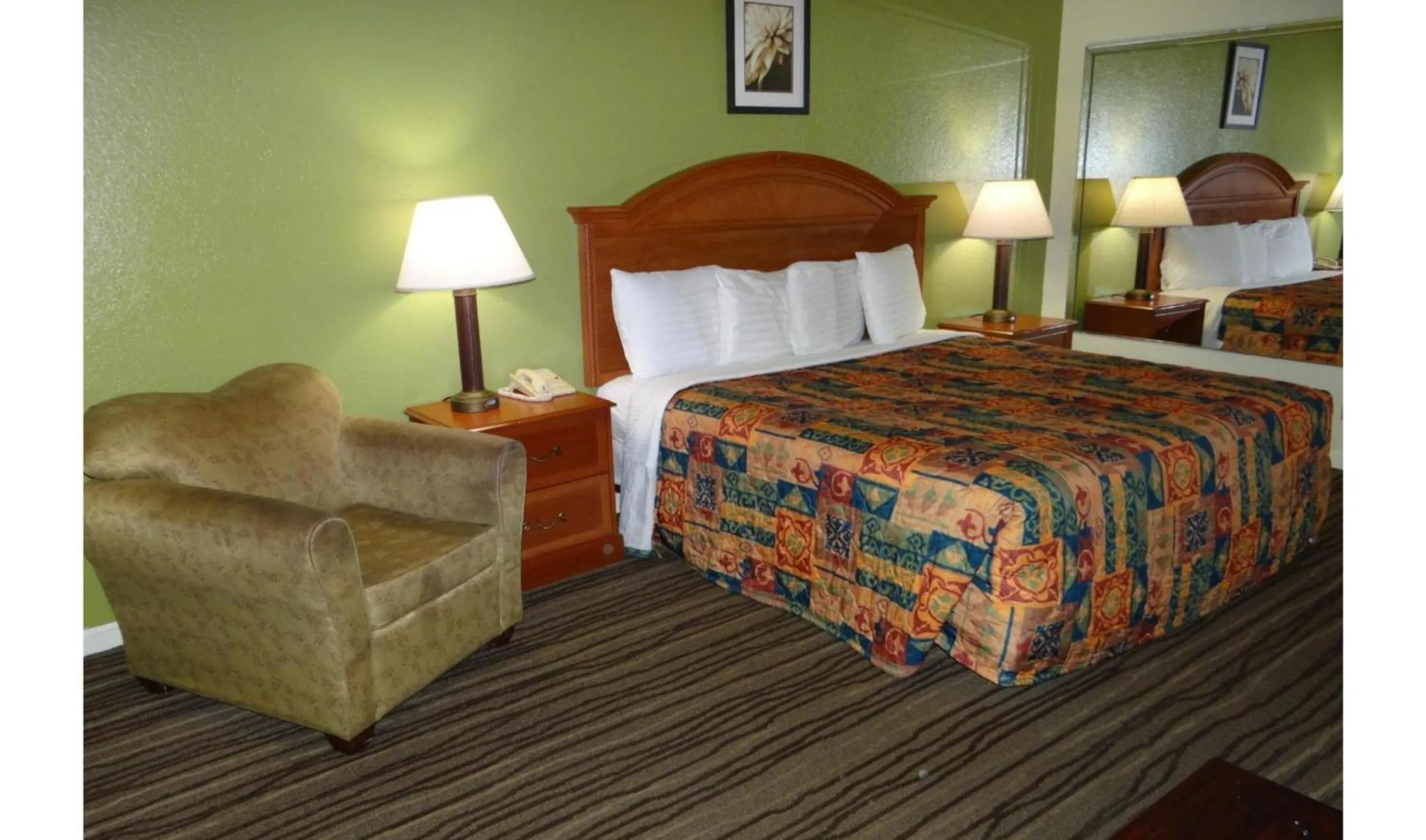 Bedroom, Bed in Regency Inn & Suites Houston East I 10