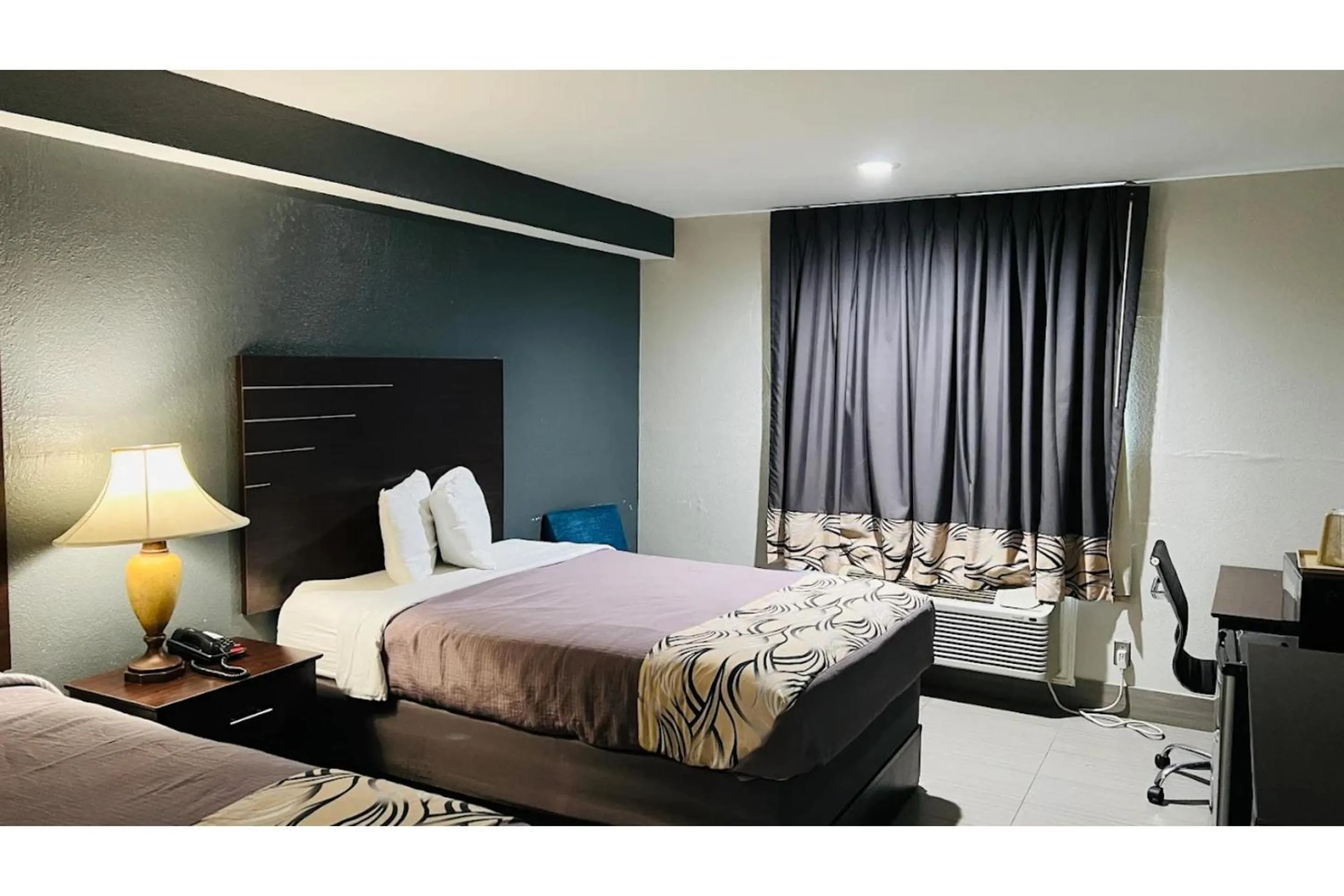 Bedroom, Bed in Regency Inn & Suites Houston East I 10