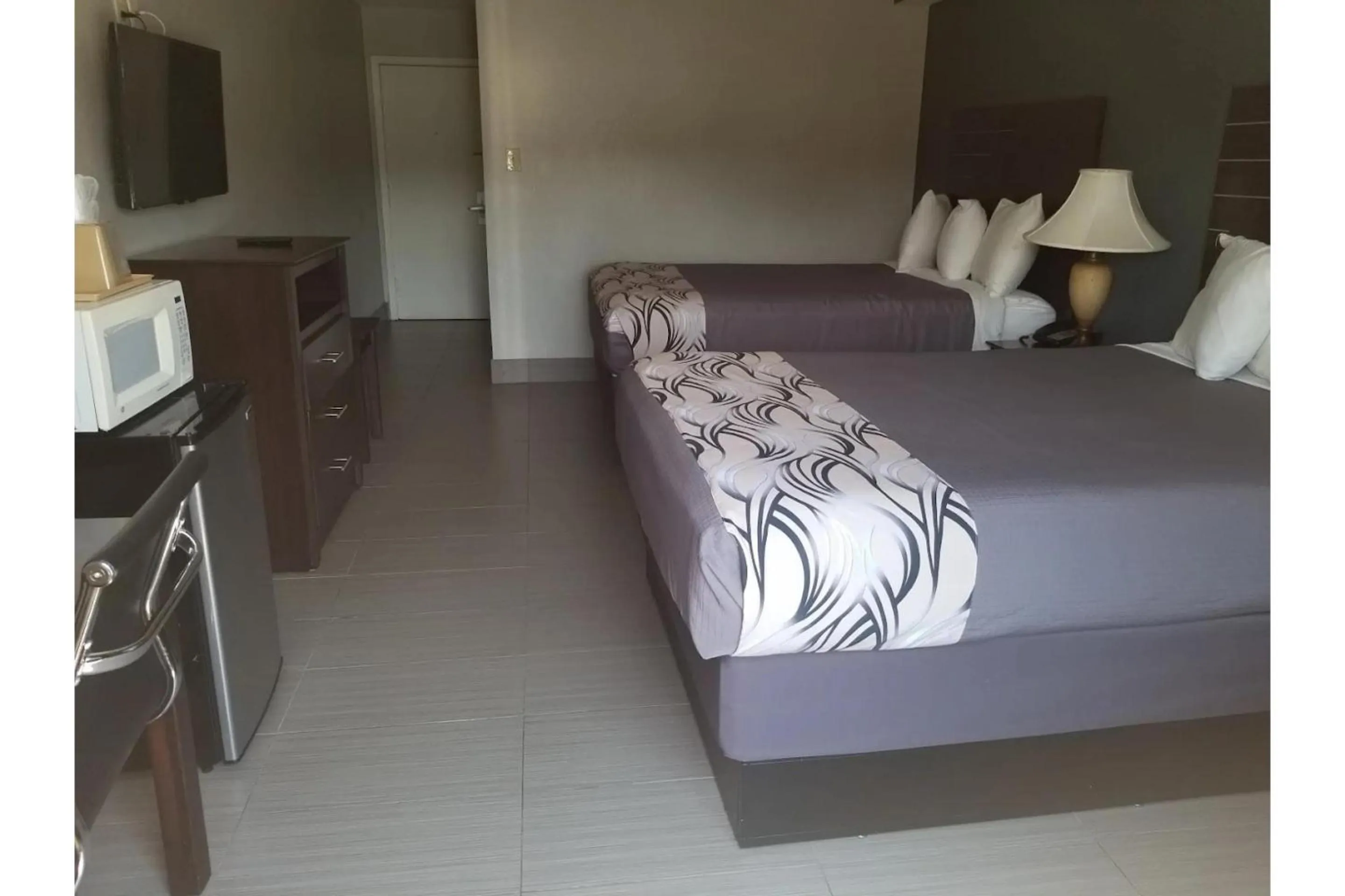 Bedroom, Bed in Regency Inn & Suites Houston East I 10