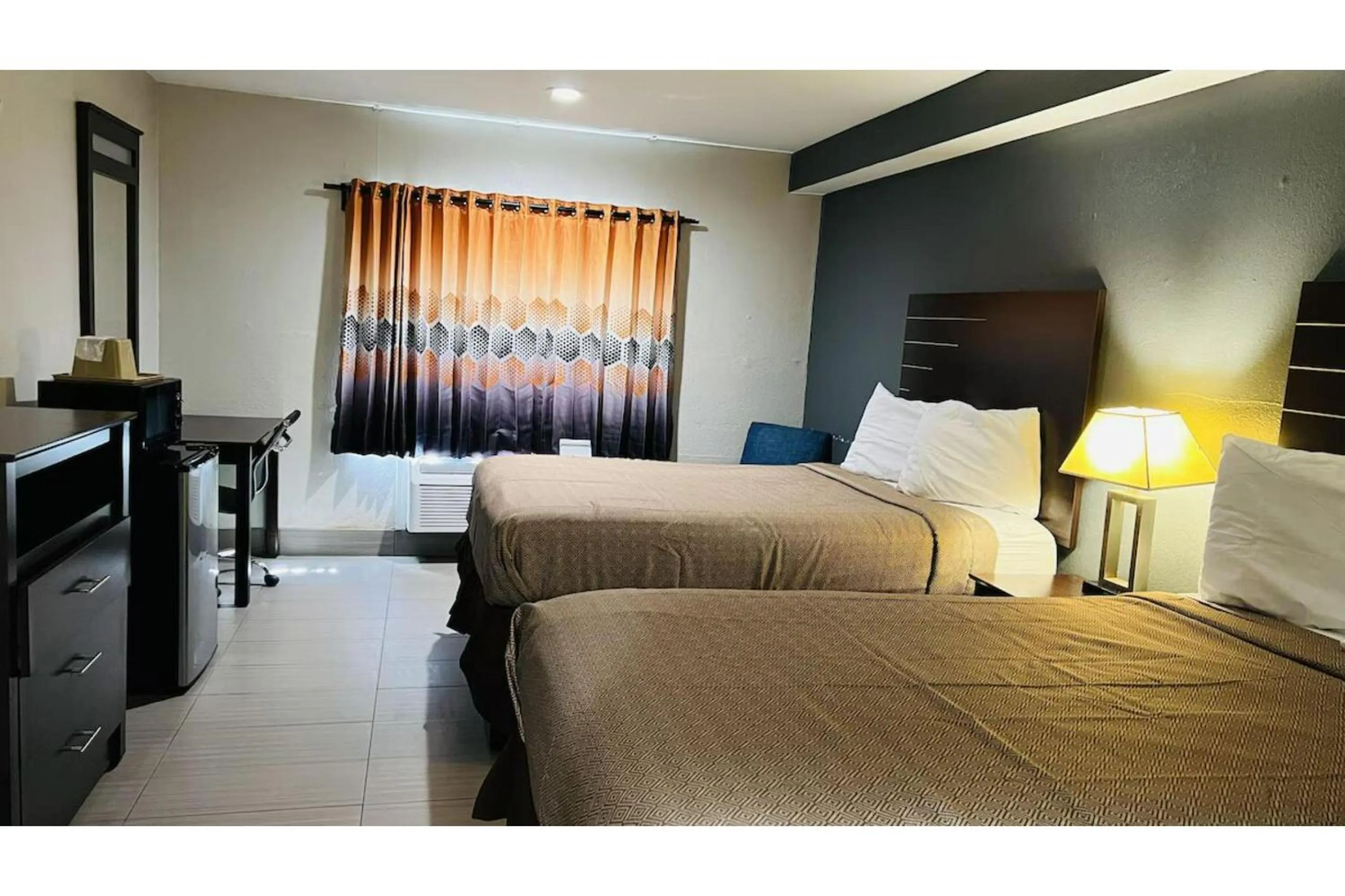 Bedroom, Bed in Regency Inn & Suites Houston East I 10