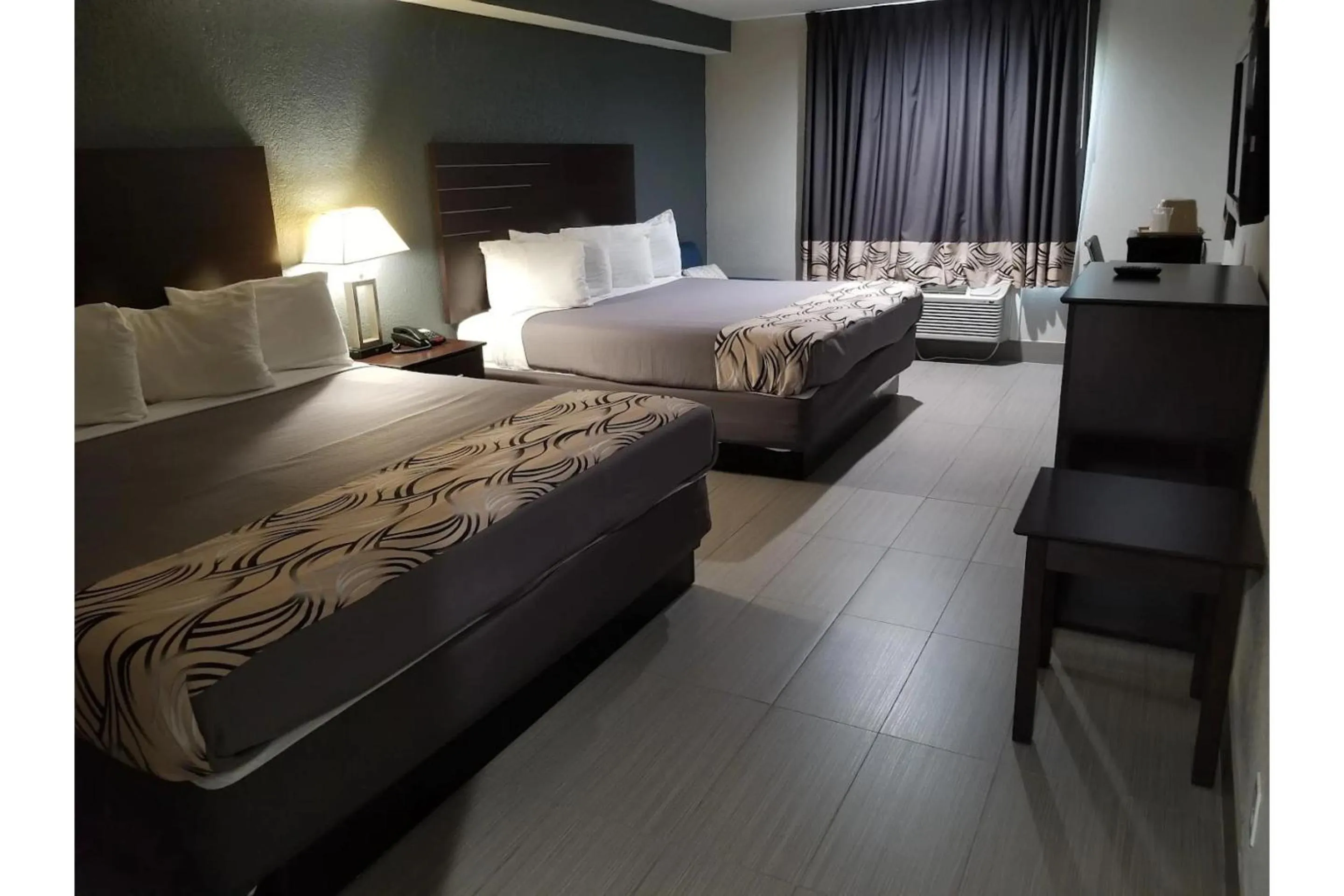 Bedroom, Bed in Regency Inn & Suites Houston East I 10