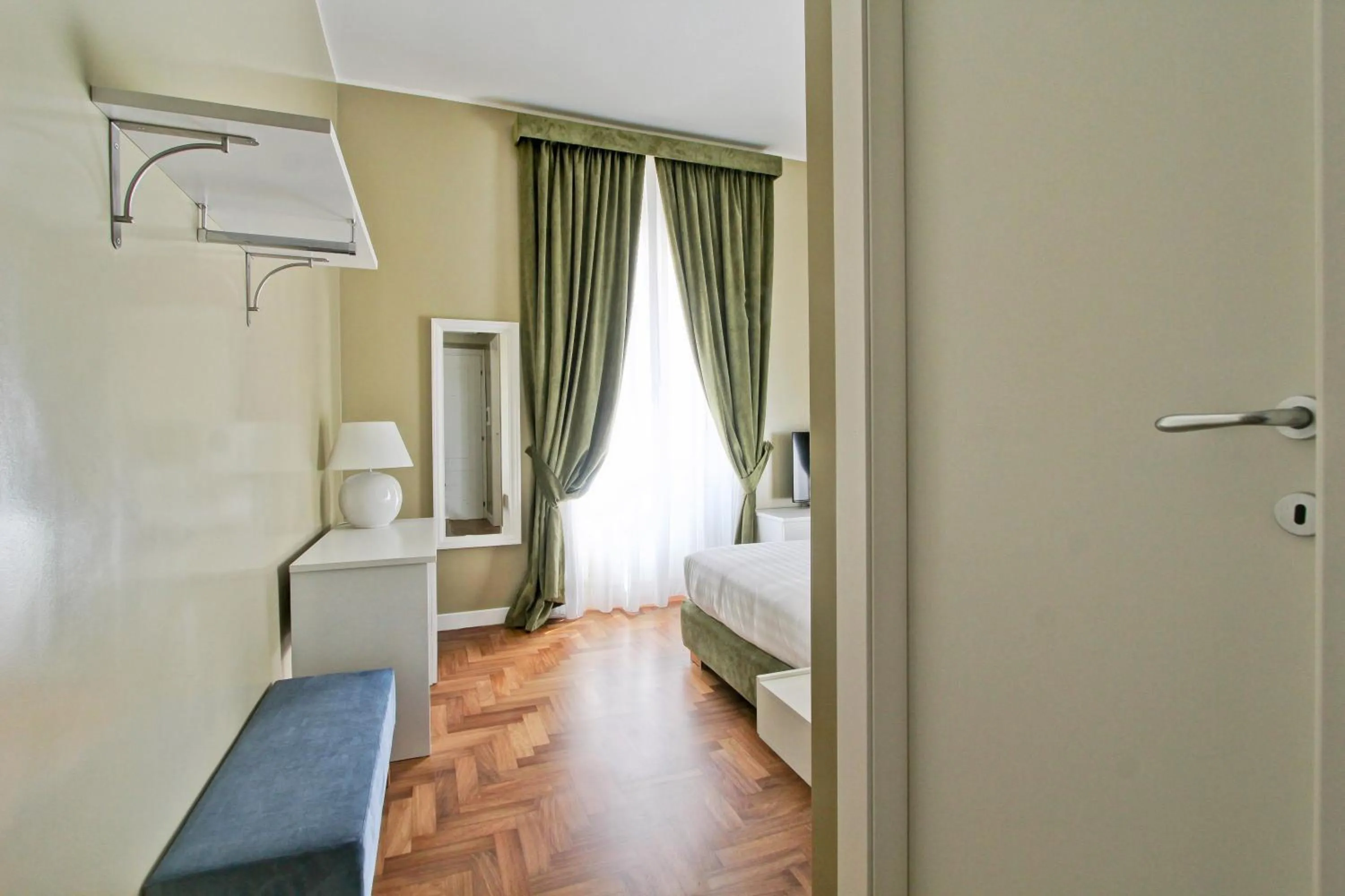 Photo of the whole room, Bed in The river corner