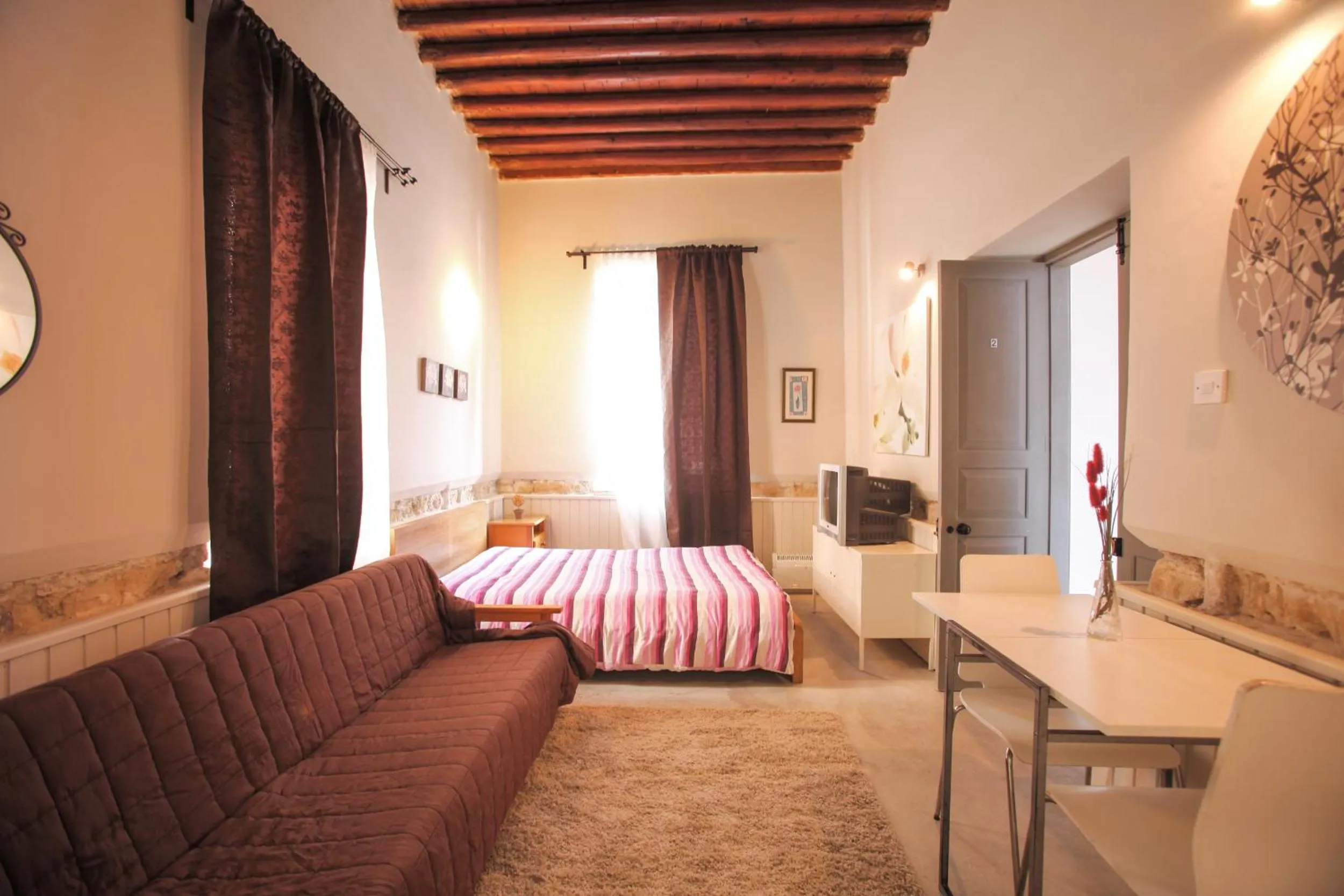 Photo of the whole room, Bed in St. Lazaros Studios