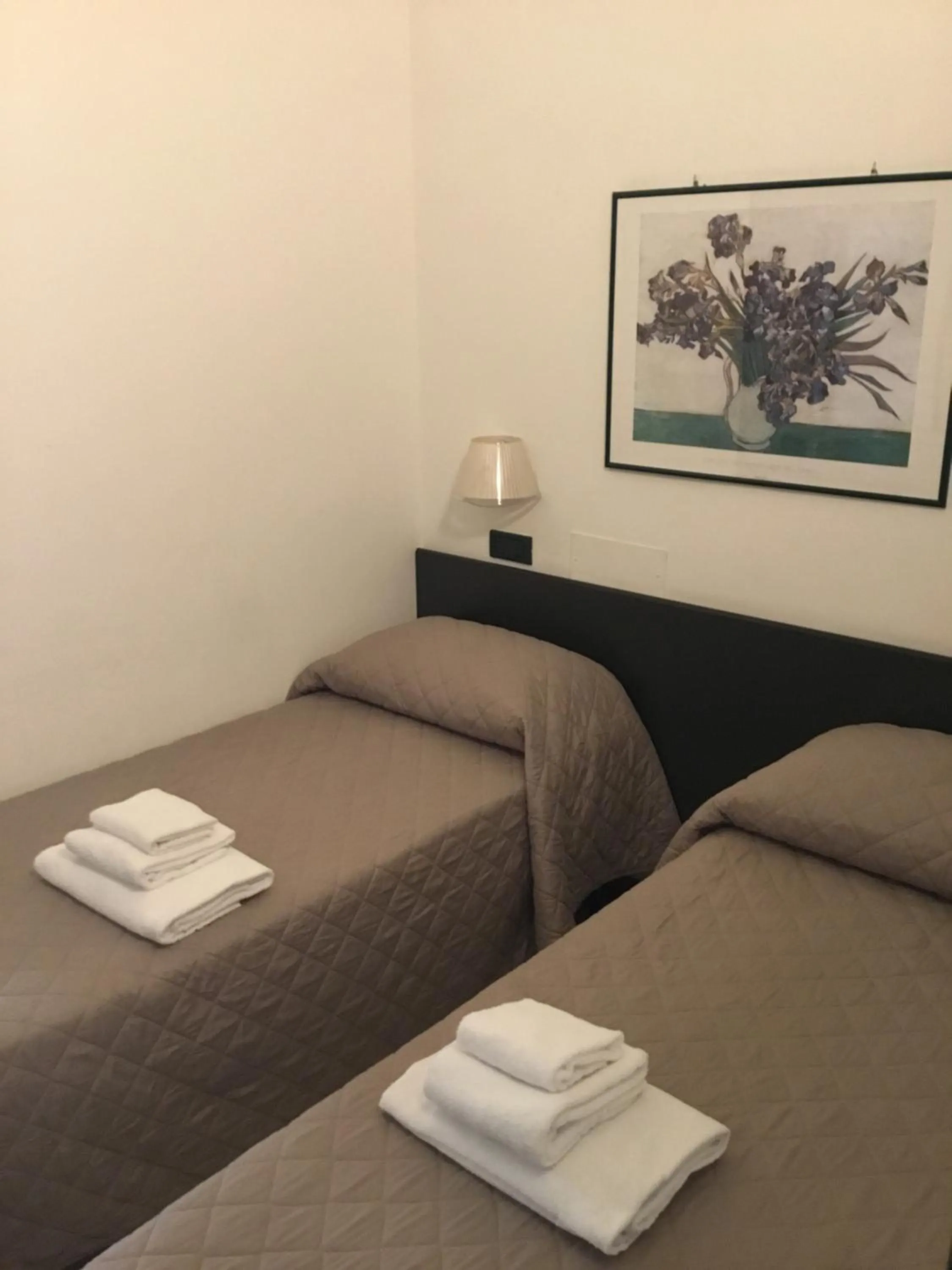 Bed in SI Rimini Hotel